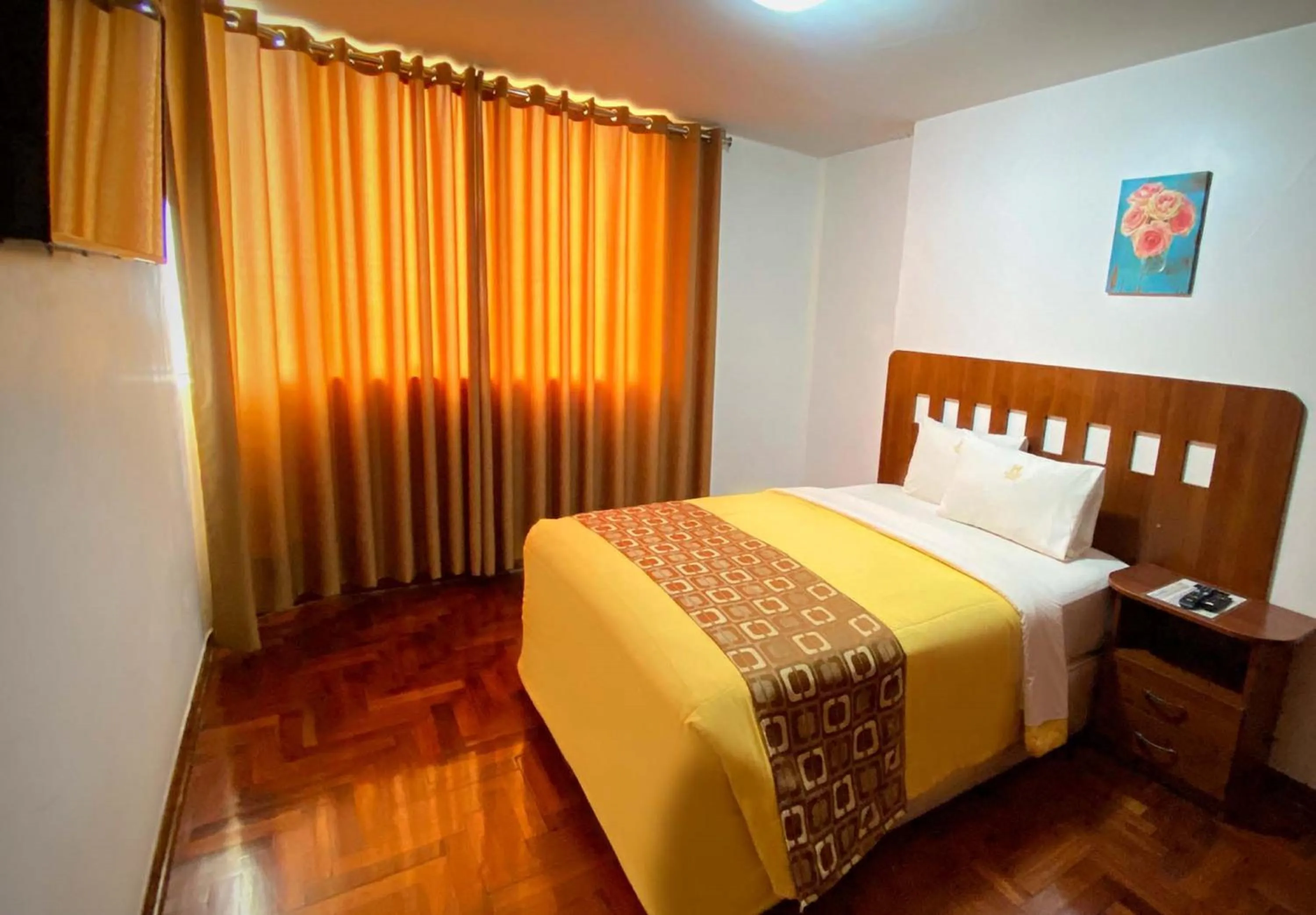 Bed in Inkari Apart Hotel