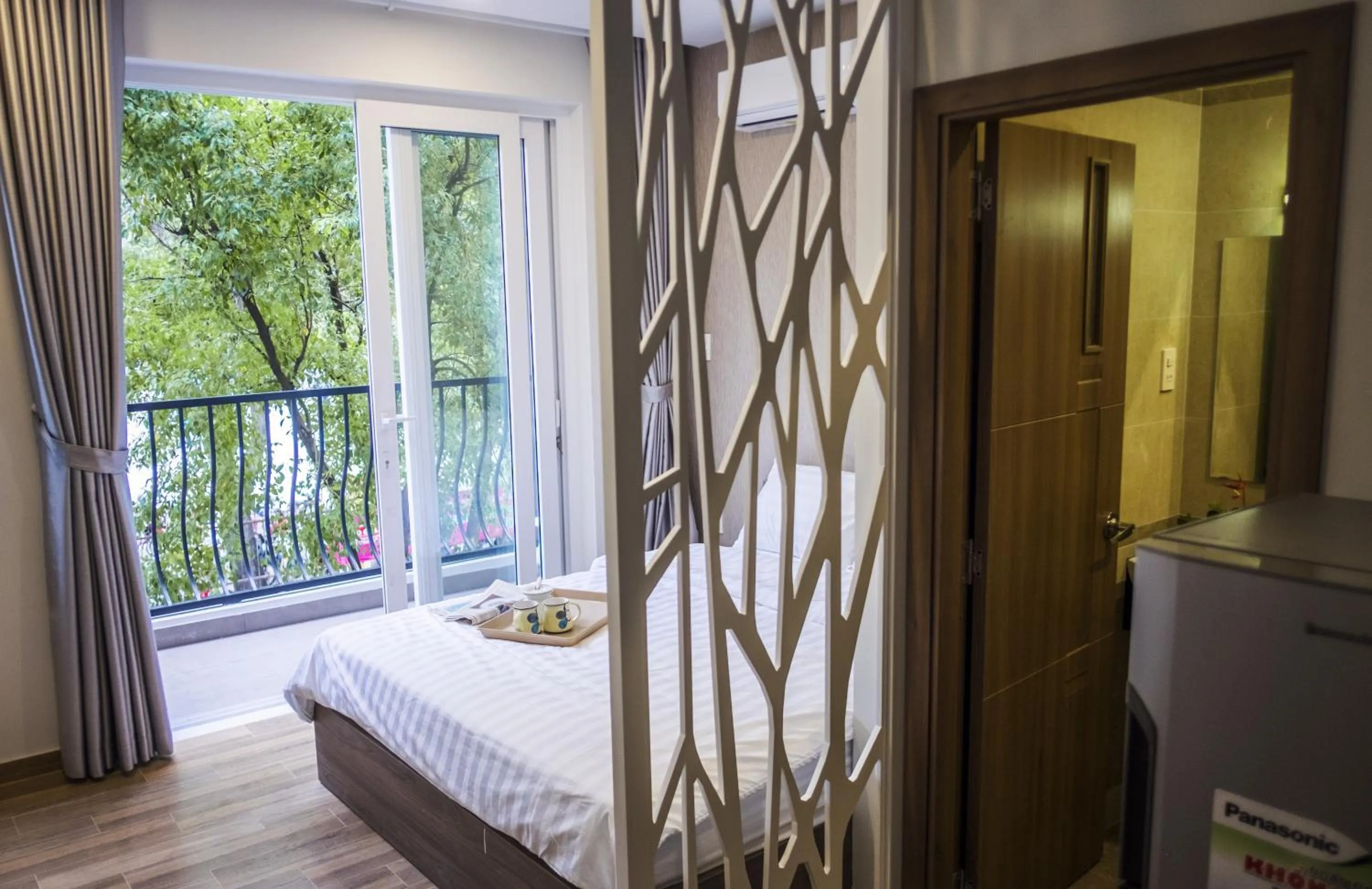 Photo of the whole room, Bed in Spring Light Home