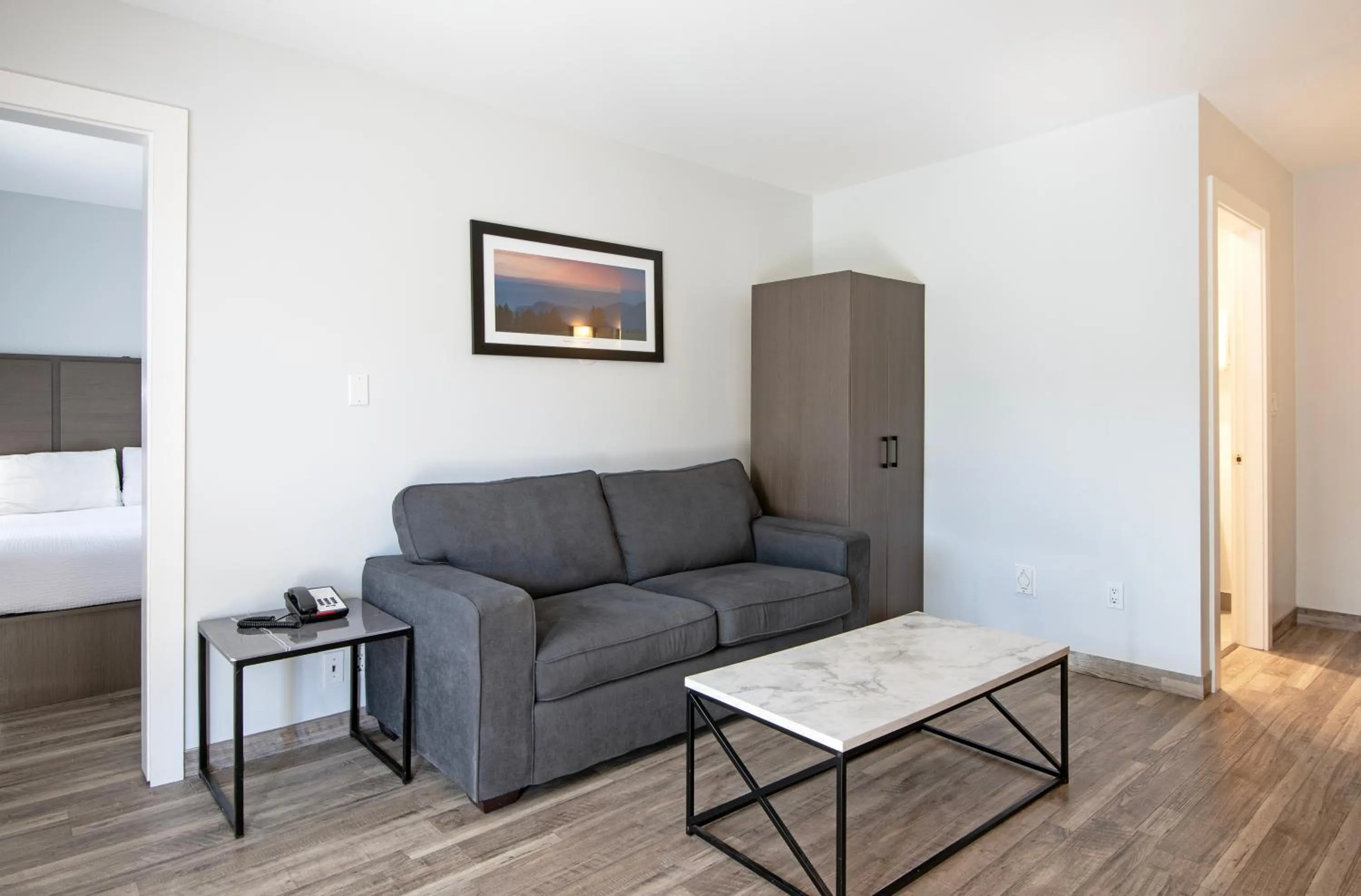 Bed in Riverland Inn & Suites