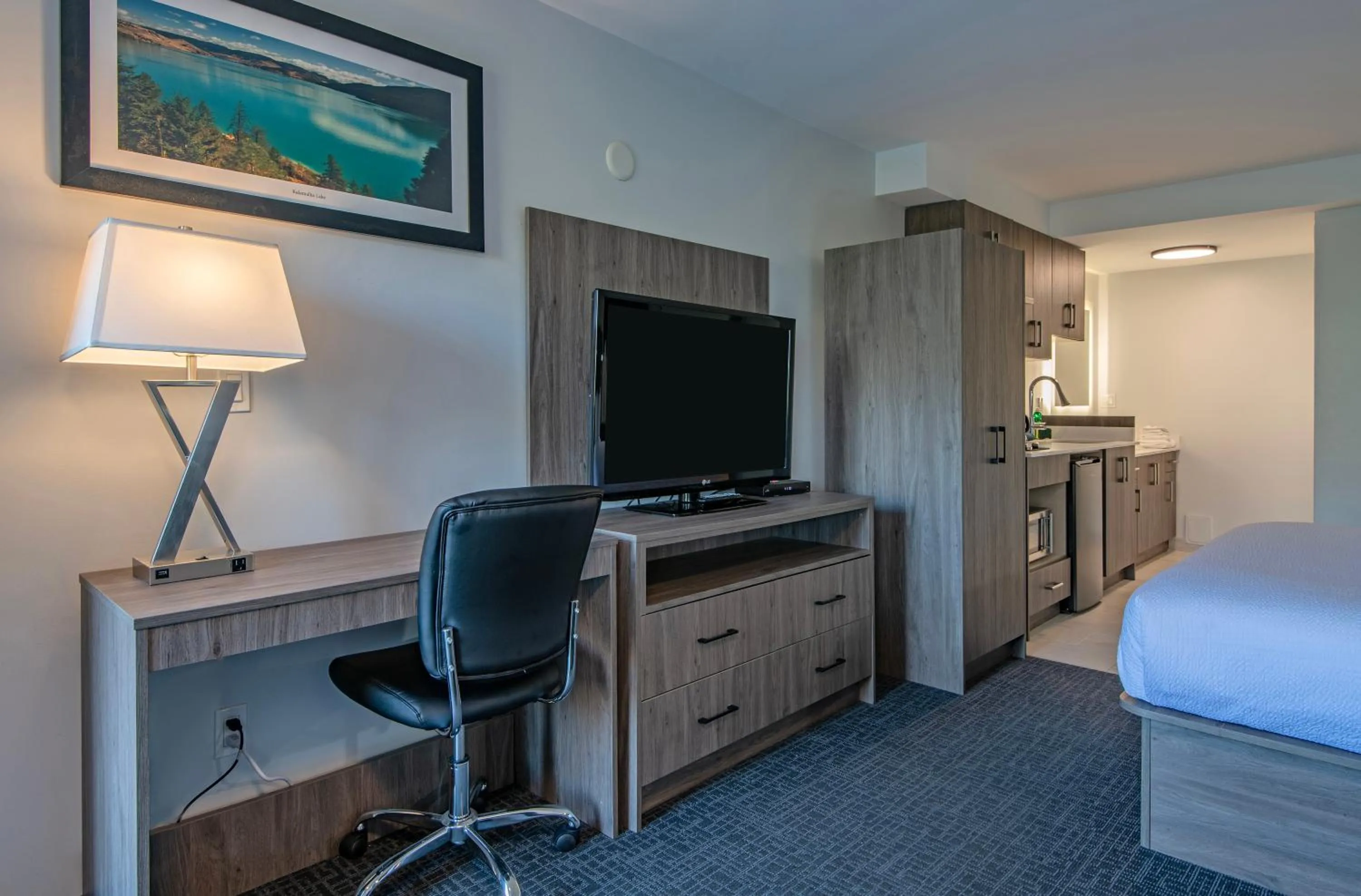 Bed in Riverland Inn & Suites