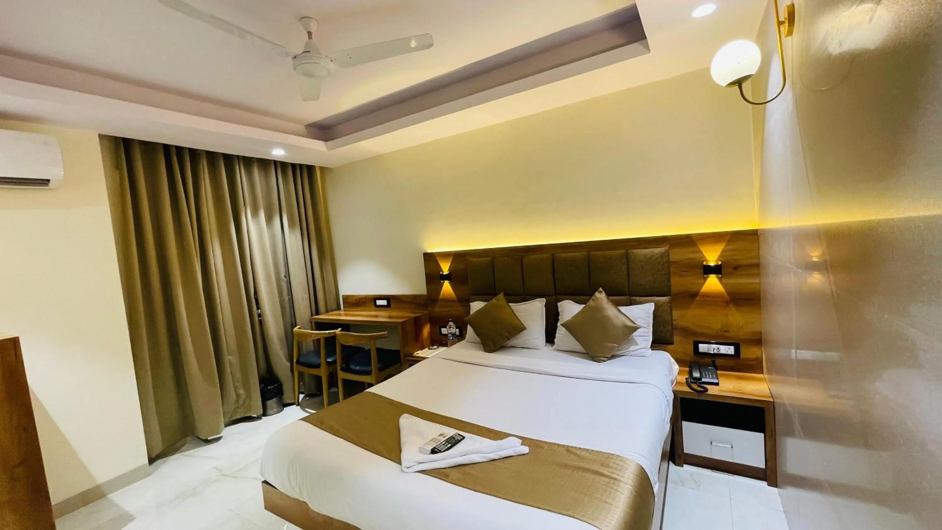 Bed in Hotel Arma Residency