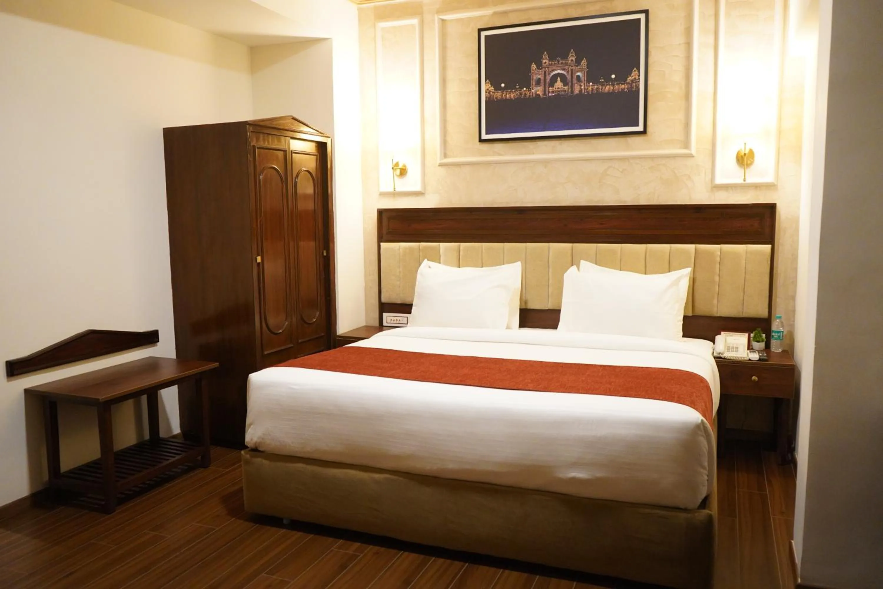 Bed in Nalapad's Hotel Bangalore International