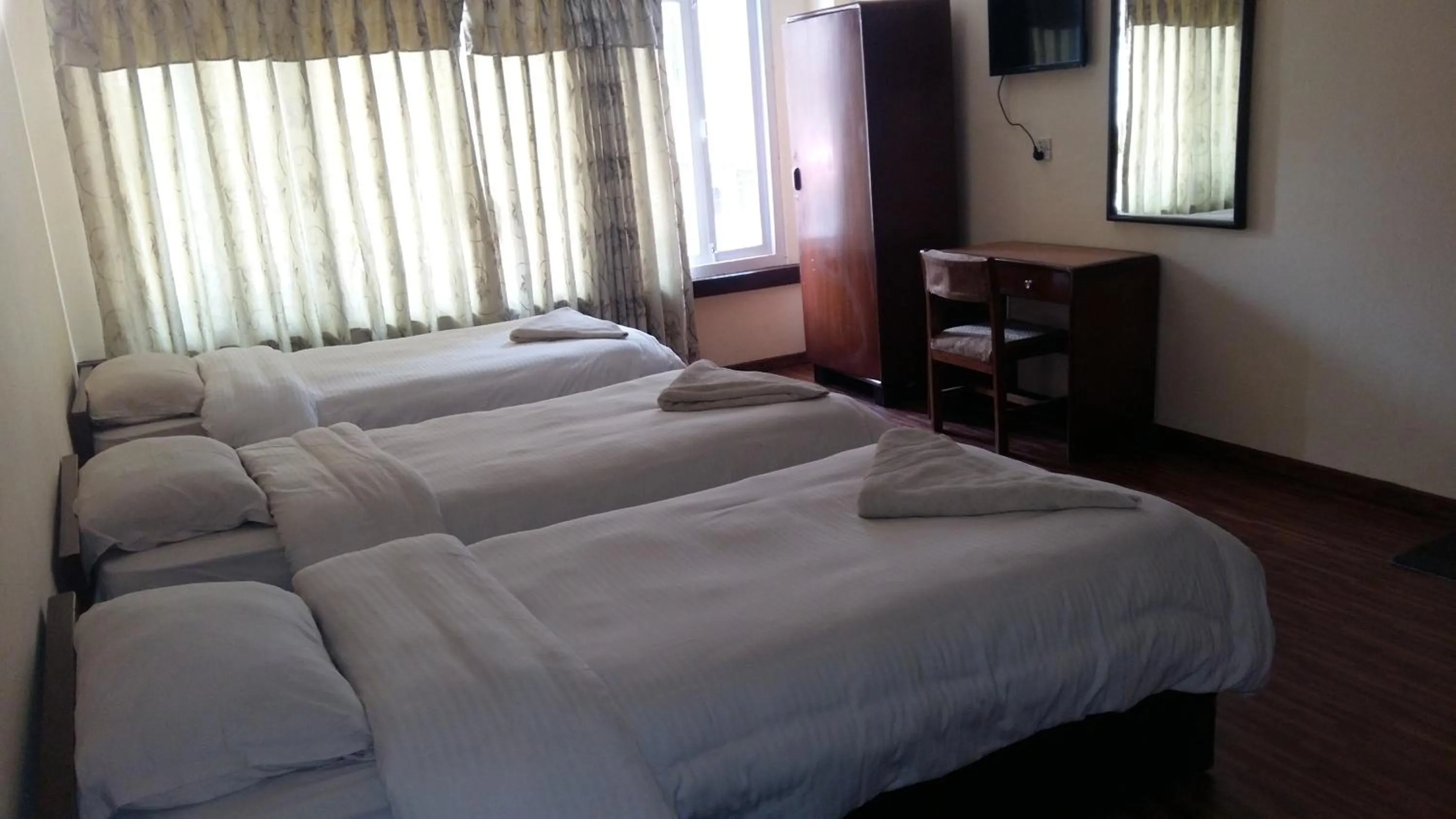 Bed in Kathmandu Madhuban Guest House