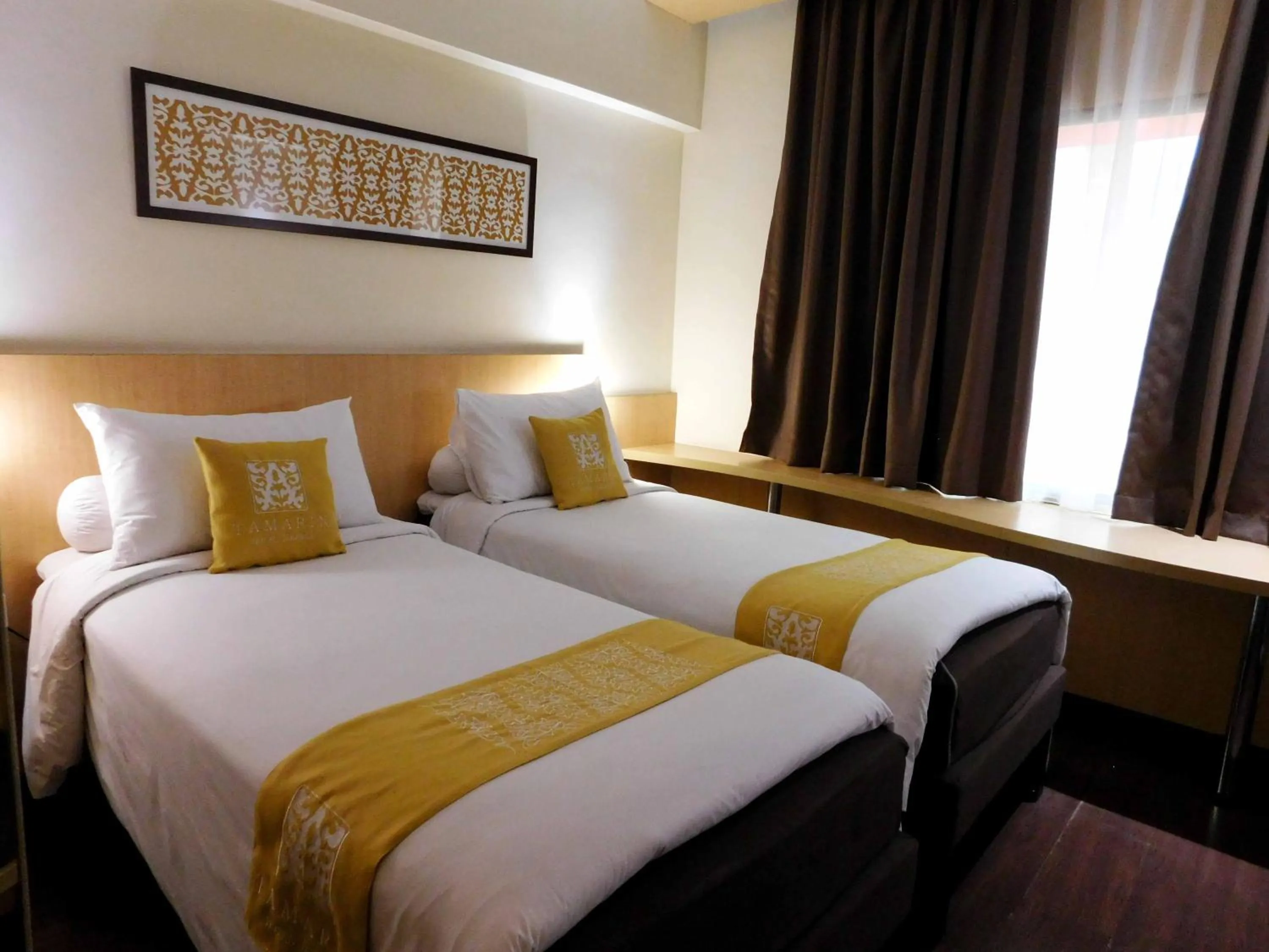 Bedroom in Tamarin Hotel Jakarta manage by Vib Hospitality Management