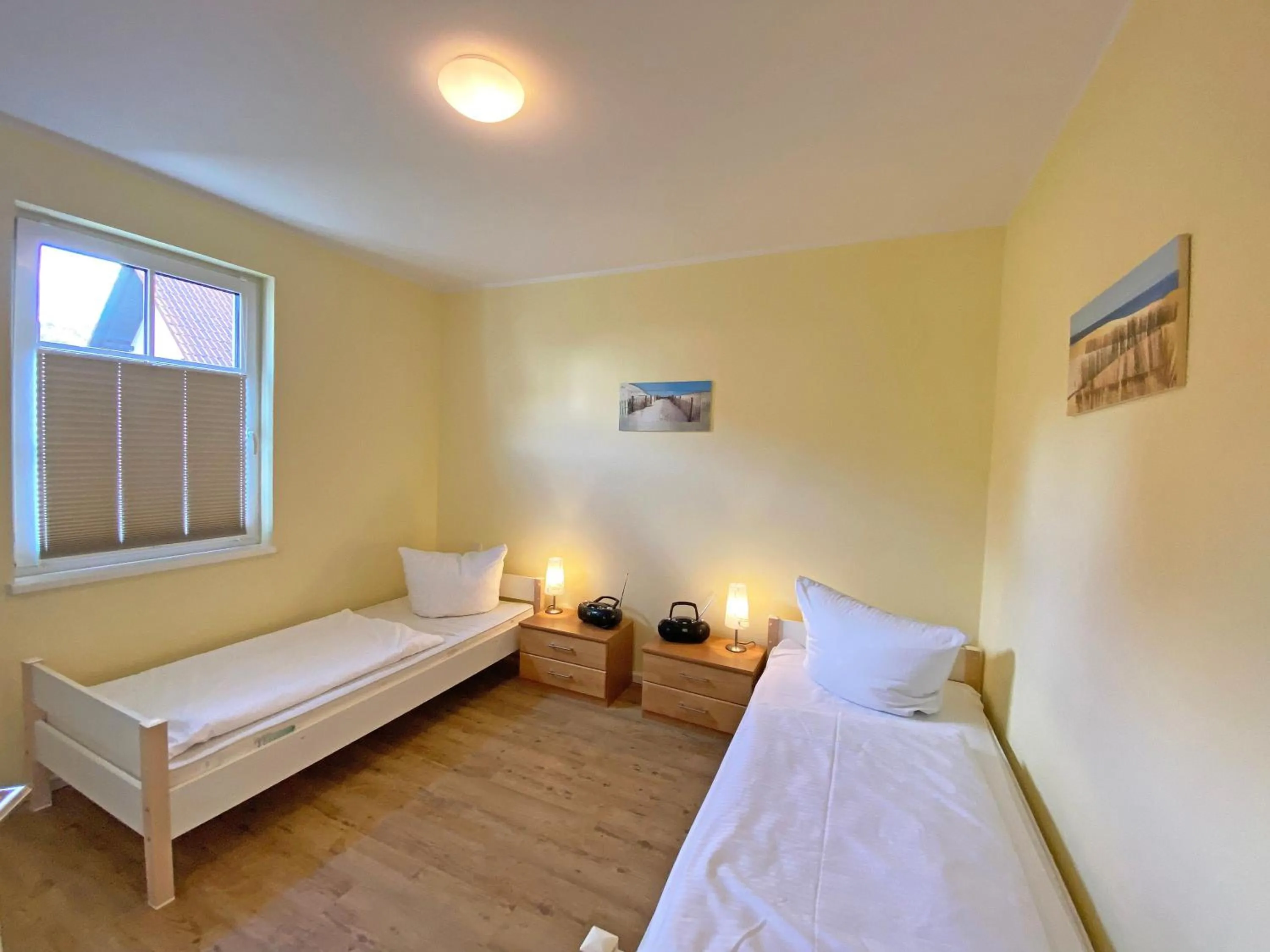 Bed in Villa Annika - Whg 10 mit Westbalkon