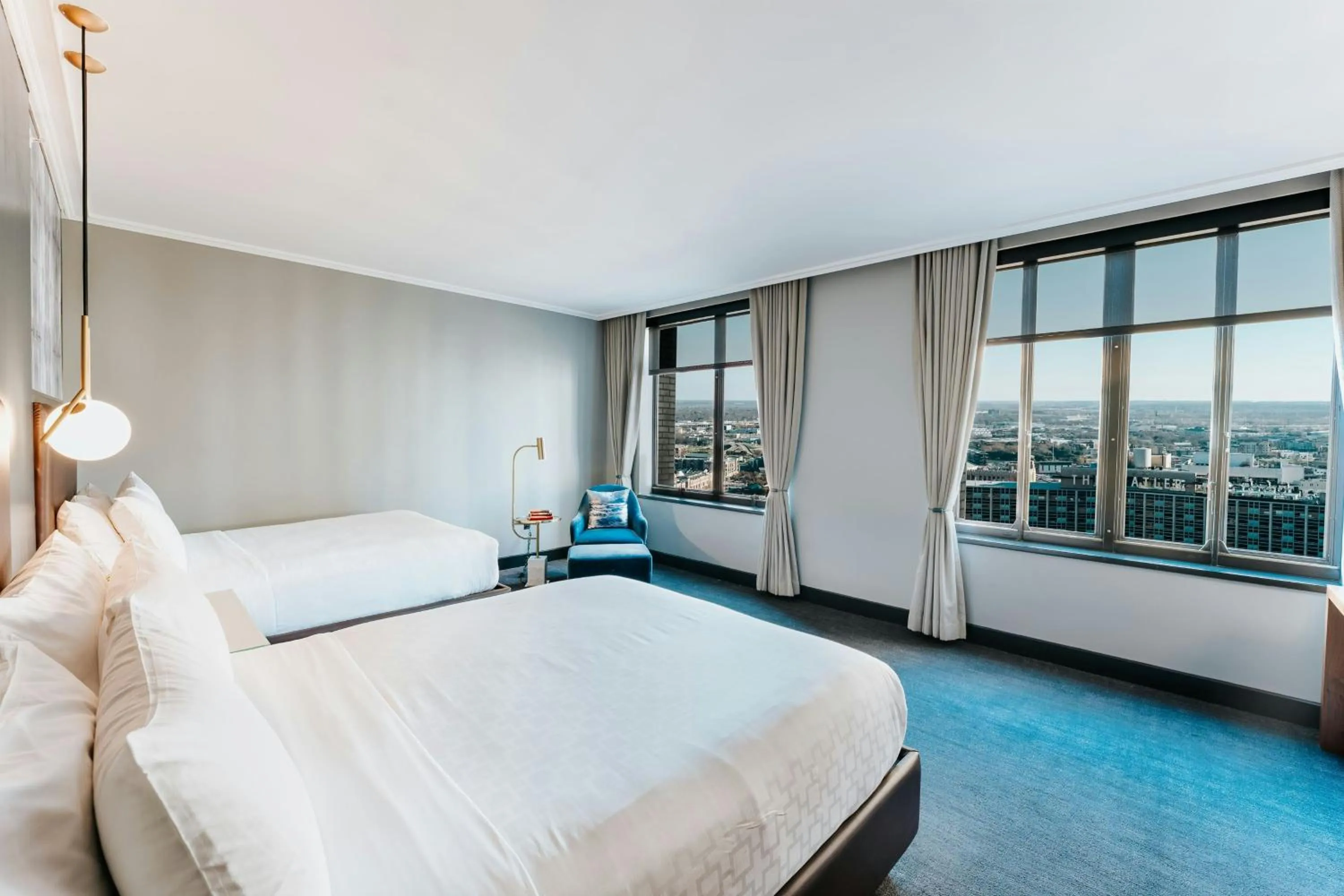 Photo of the whole room, Bed in Renaissance Saint Elm Dallas Downtown Hotel