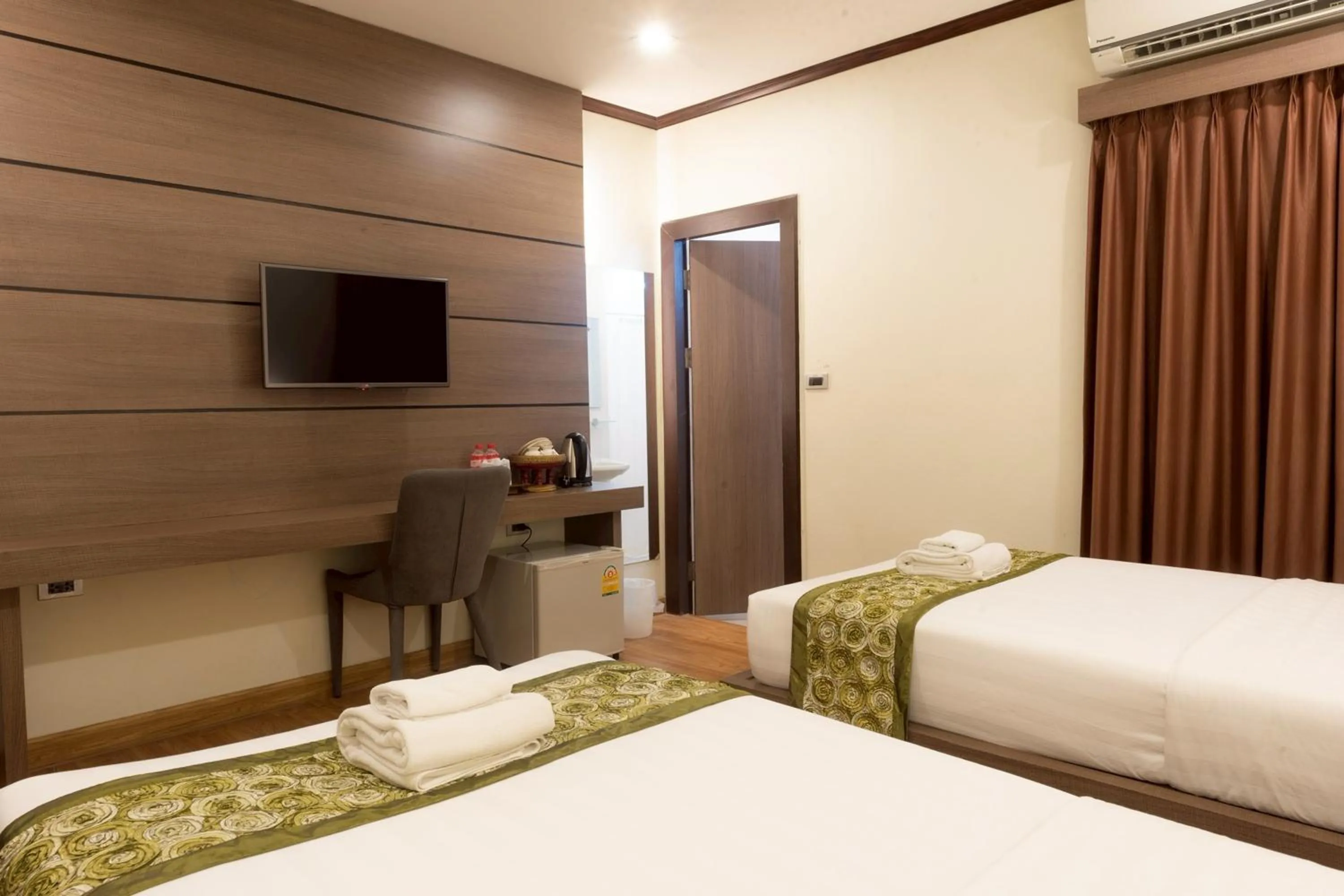 Bed in NIM SEE SENG Hotel