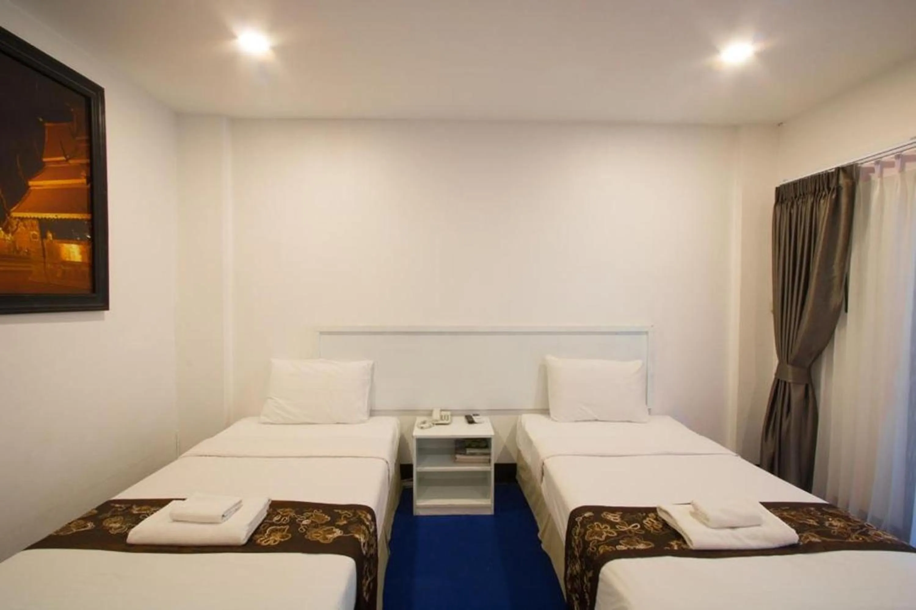 Bed in NIM SEE SENG Hotel