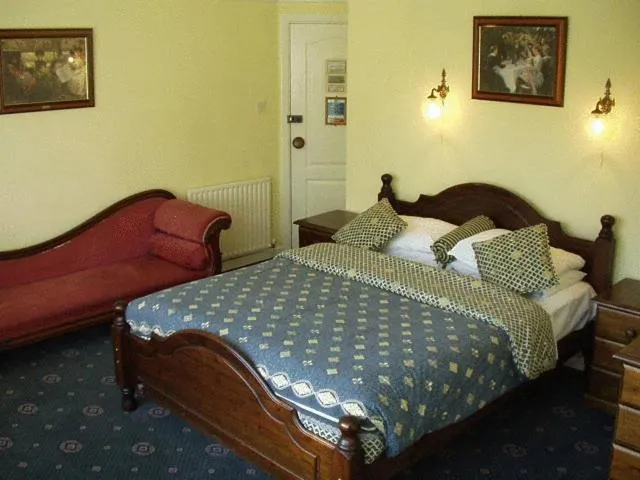 Bed in The Dial House Guest House