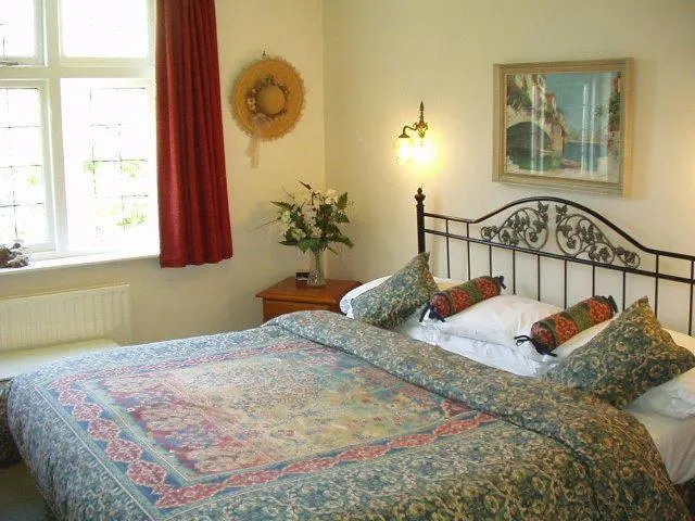 Bed in The Dial House Guest House