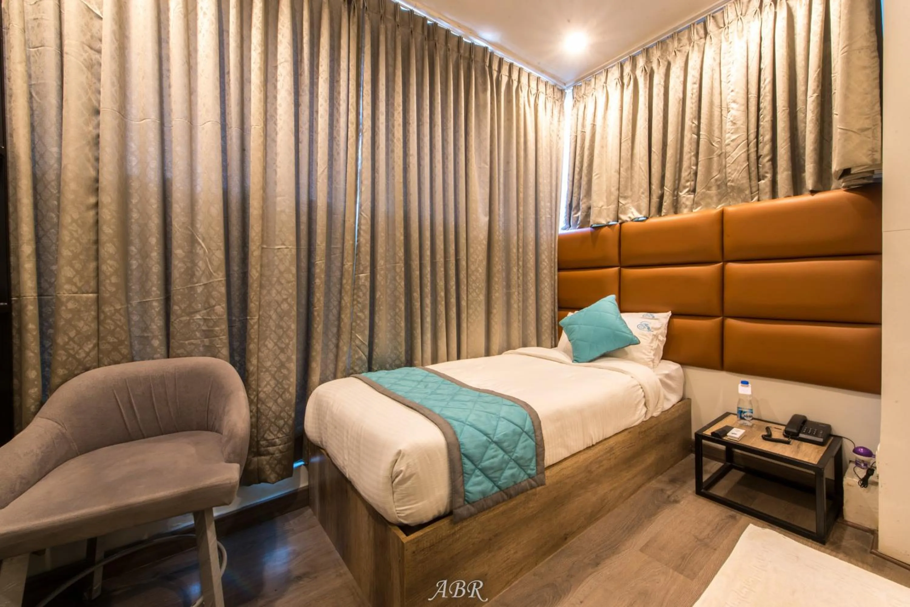 Bed in Caramel Hotels