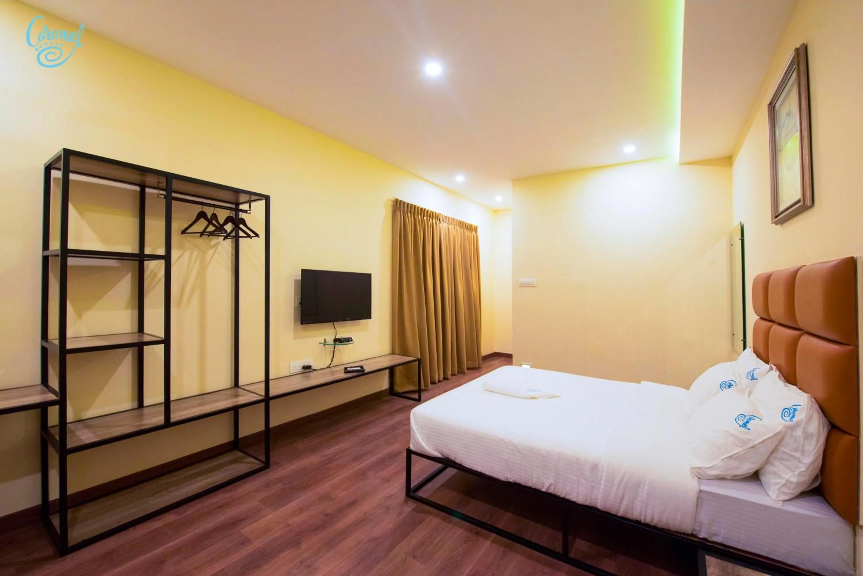 Bedroom, Bed in Caramel Hotels