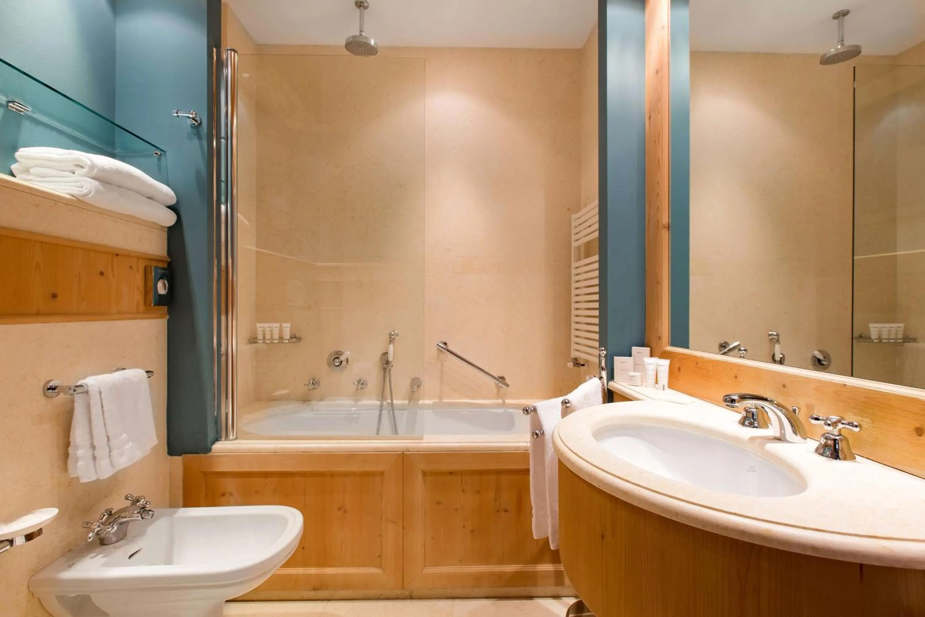 Photo of the whole room in Radisson Residences Savoia Palace Cortina d’Ampezzo