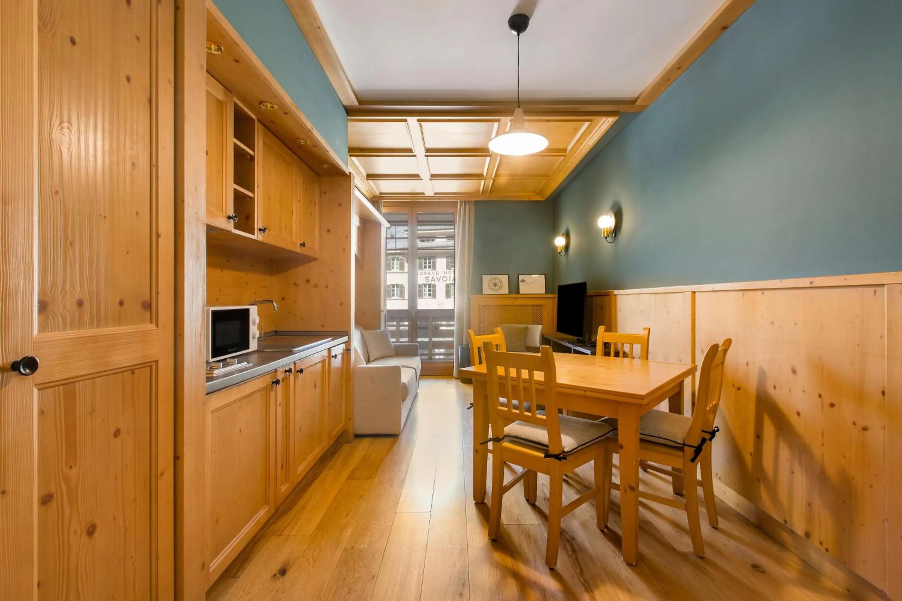 Photo of the whole room in Radisson Residences Savoia Palace Cortina d’Ampezzo