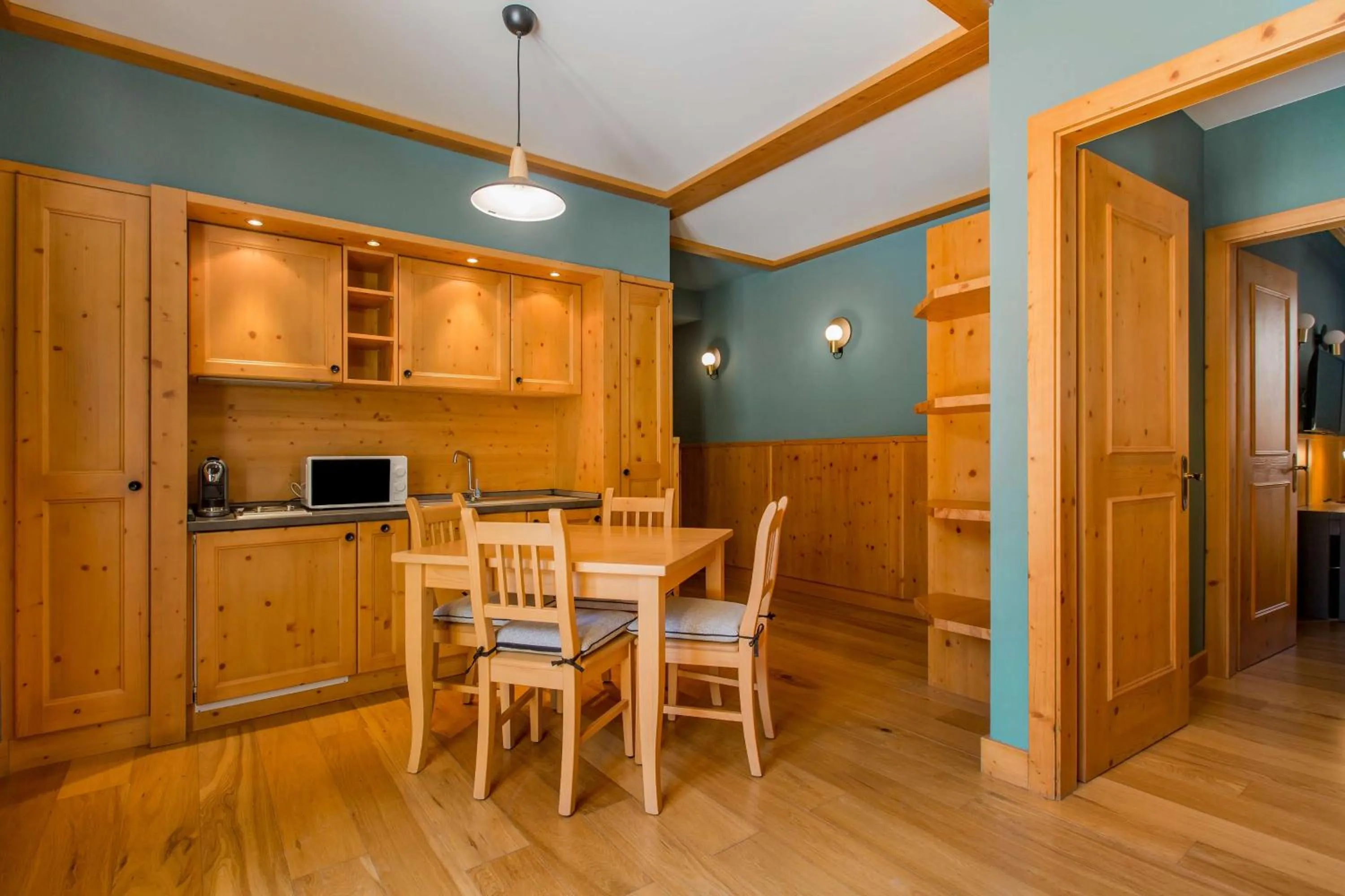 Photo of the whole room in Radisson Residences Savoia Palace Cortina d’Ampezzo