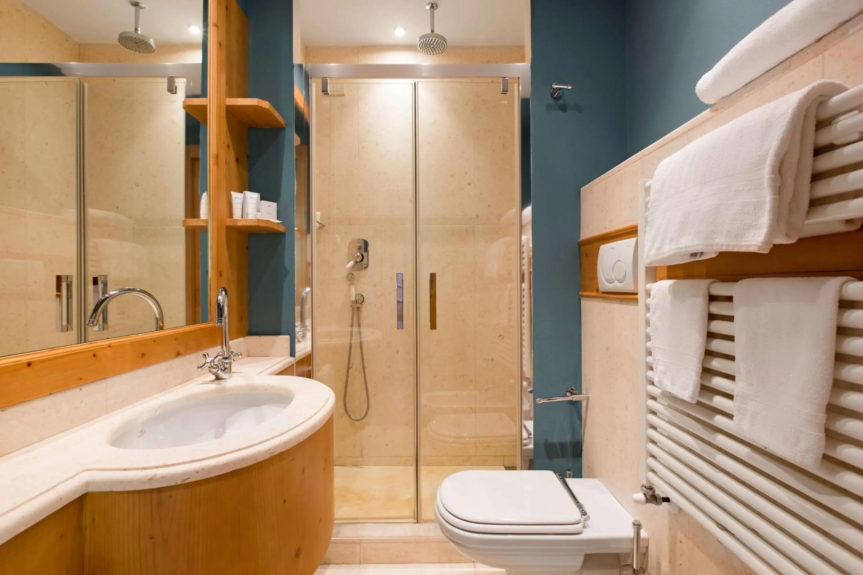 Photo of the whole room in Radisson Residences Savoia Palace Cortina d’Ampezzo