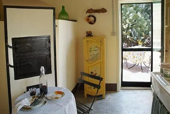 Kitchen or kitchenette in Masseria Cianciò