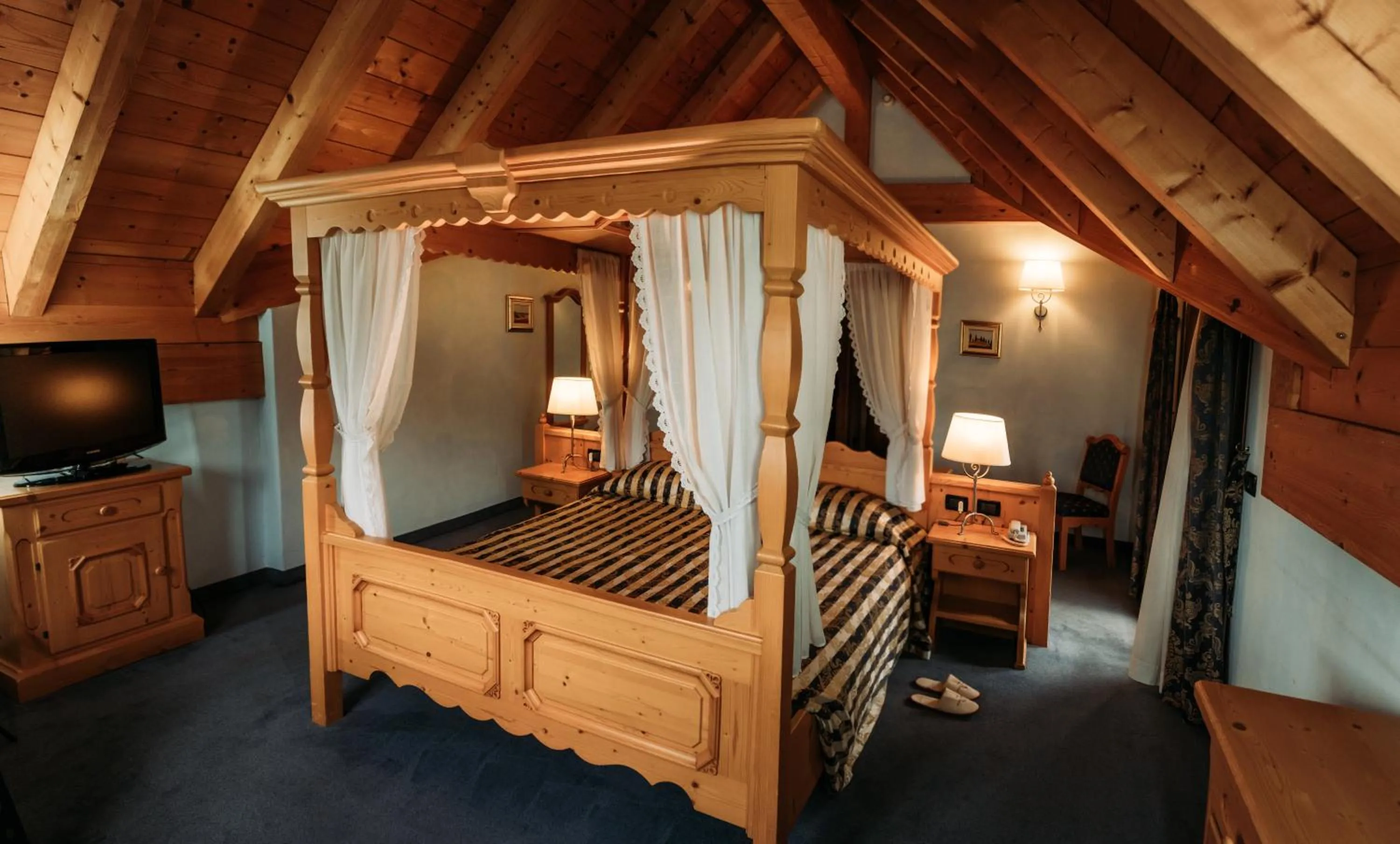 Bed in Hotel Primiero