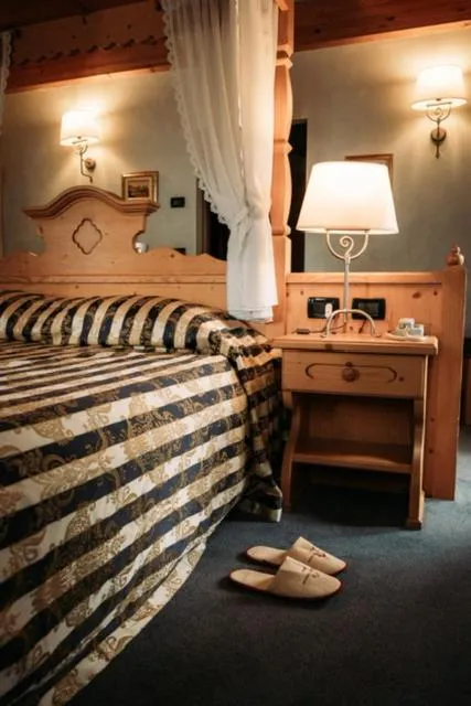 Bed in Hotel Primiero