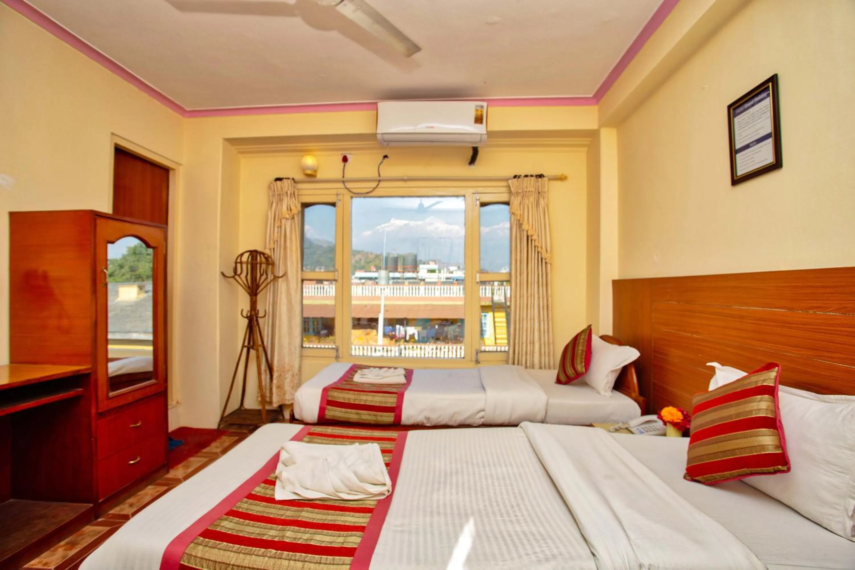 Bed in Hotel Grand Holiday