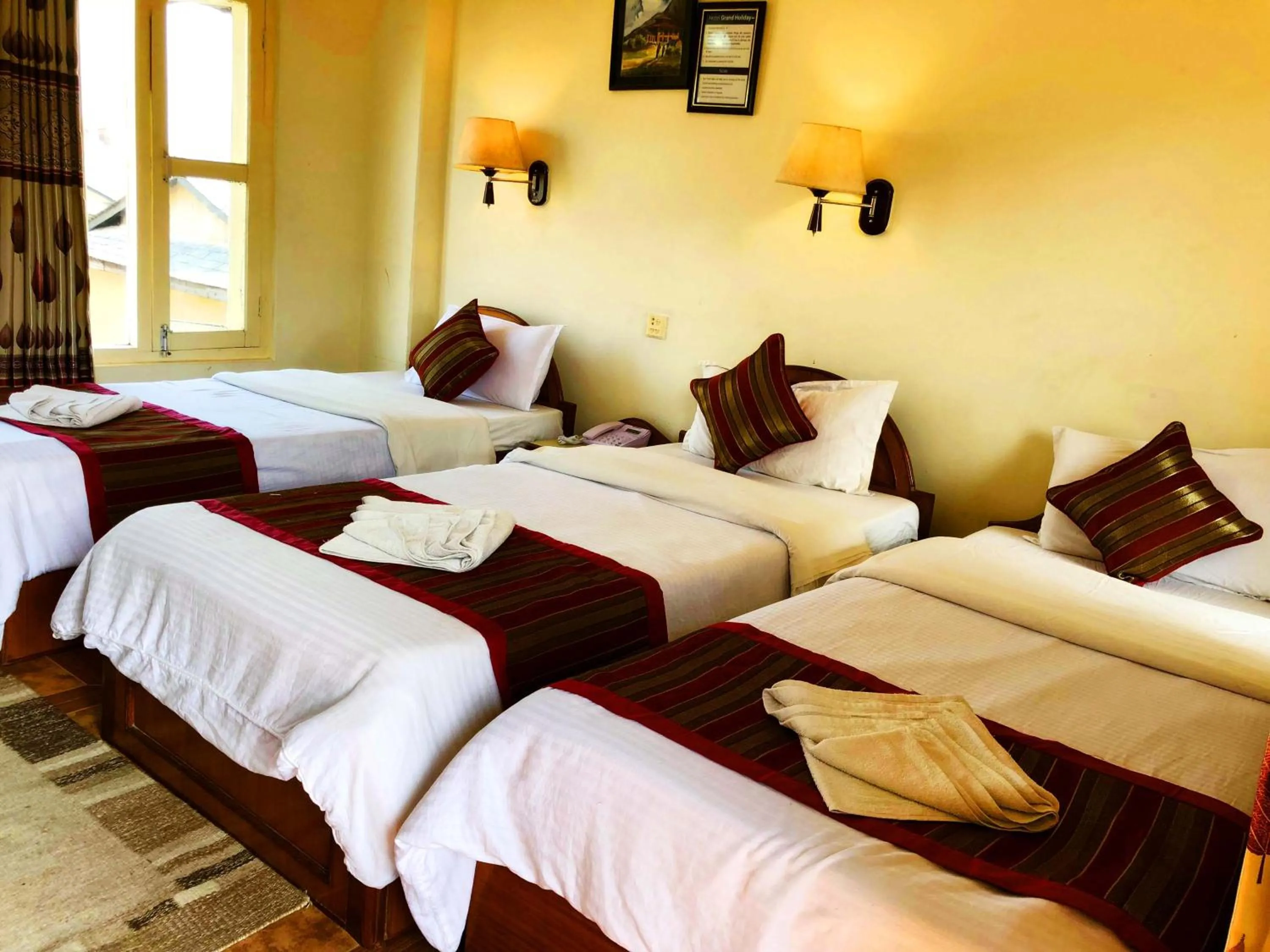 Photo of the whole room, Bed in Hotel Grand Holiday