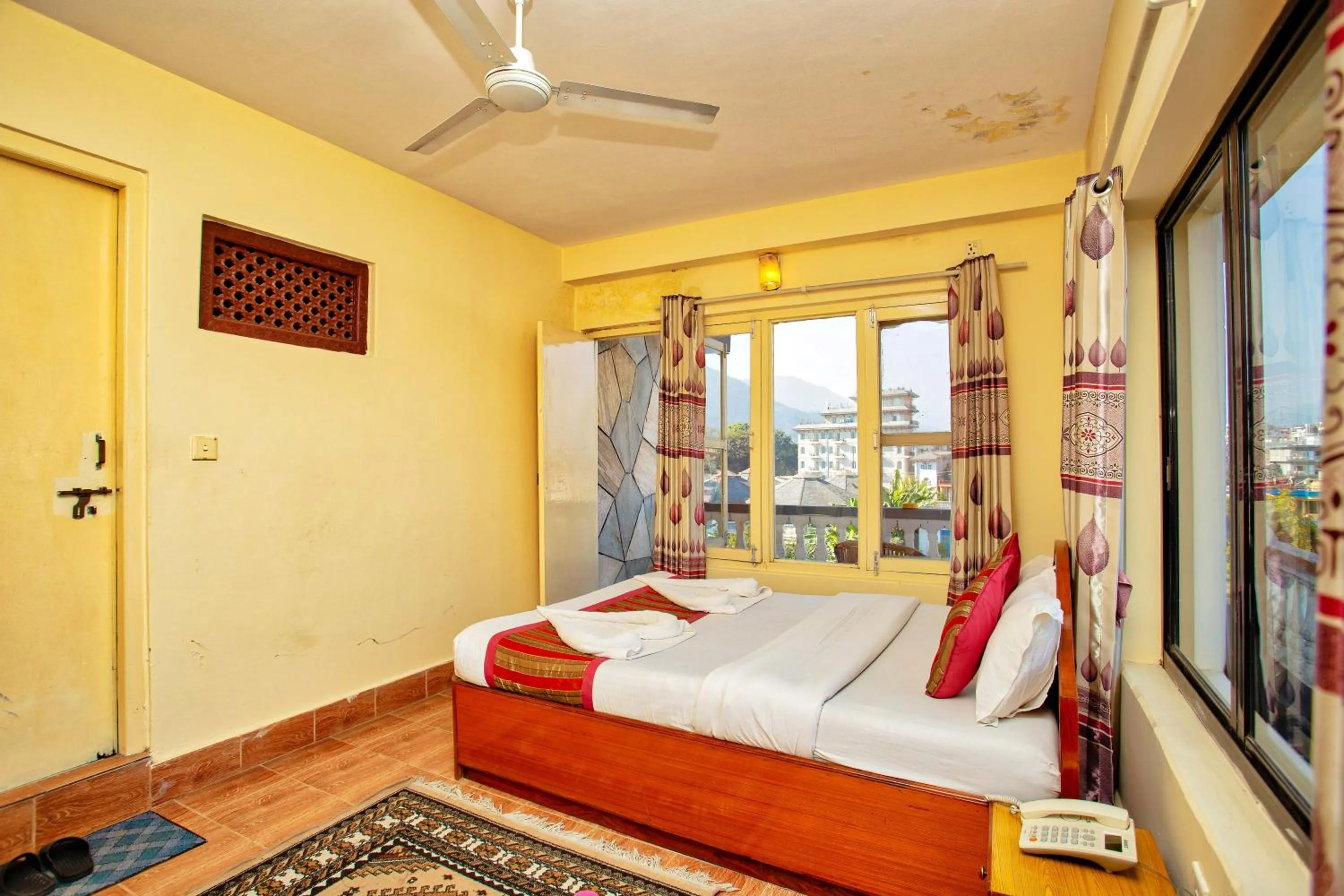 Bed in Hotel Grand Holiday