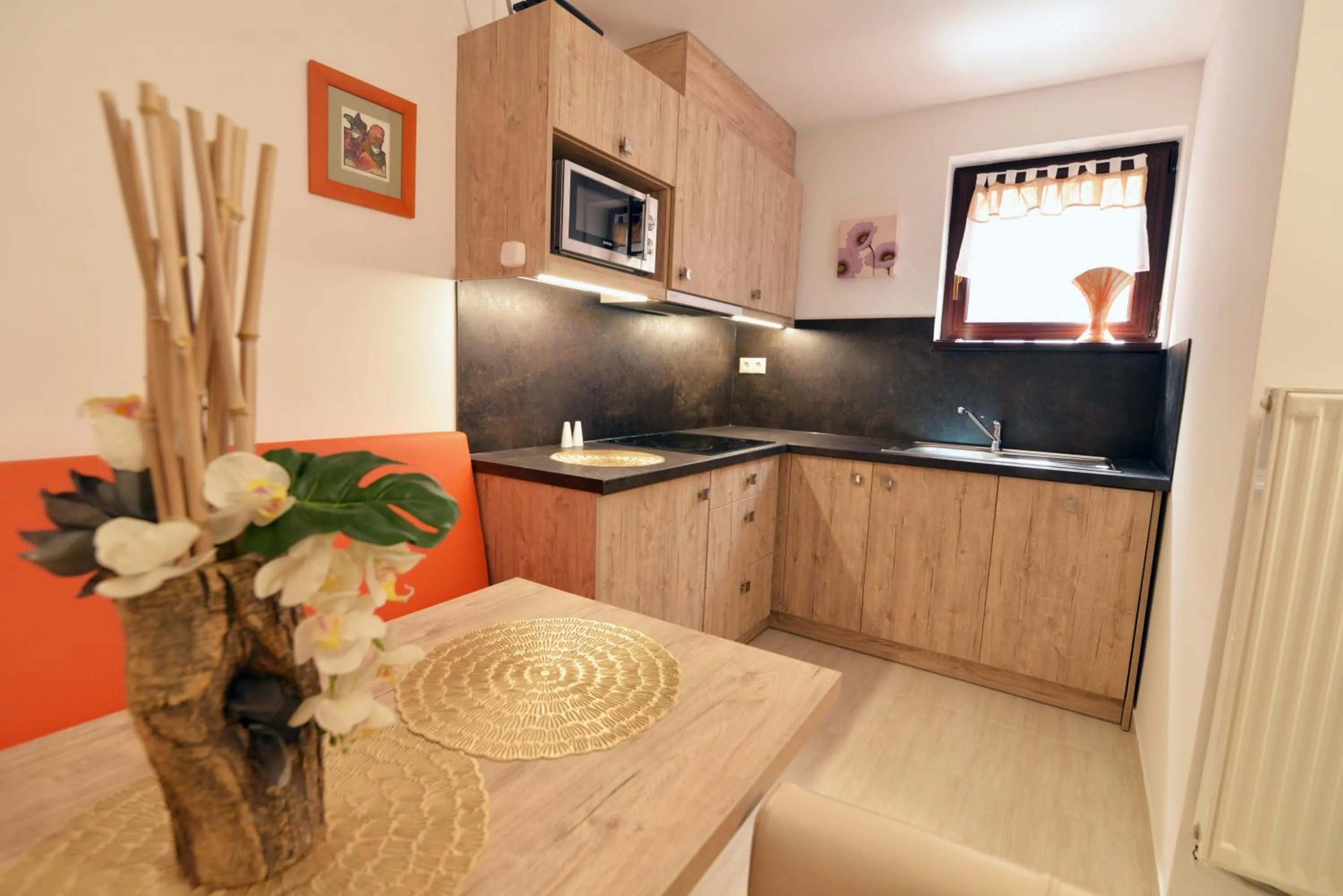 Kitchen or kitchenette in Fészek Fogadó - Pension Nest