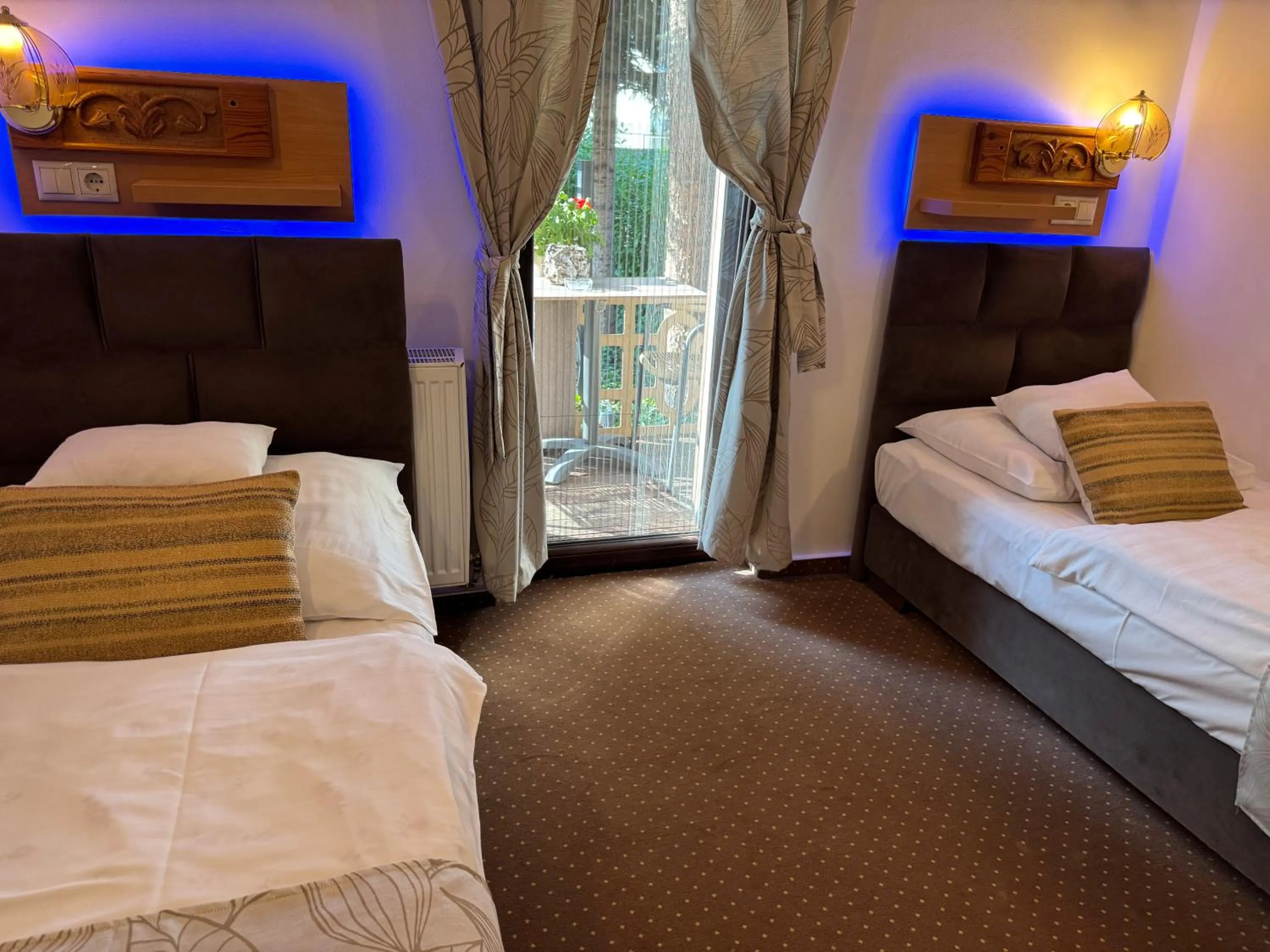 Bed in Fészek Fogadó - Pension Nest