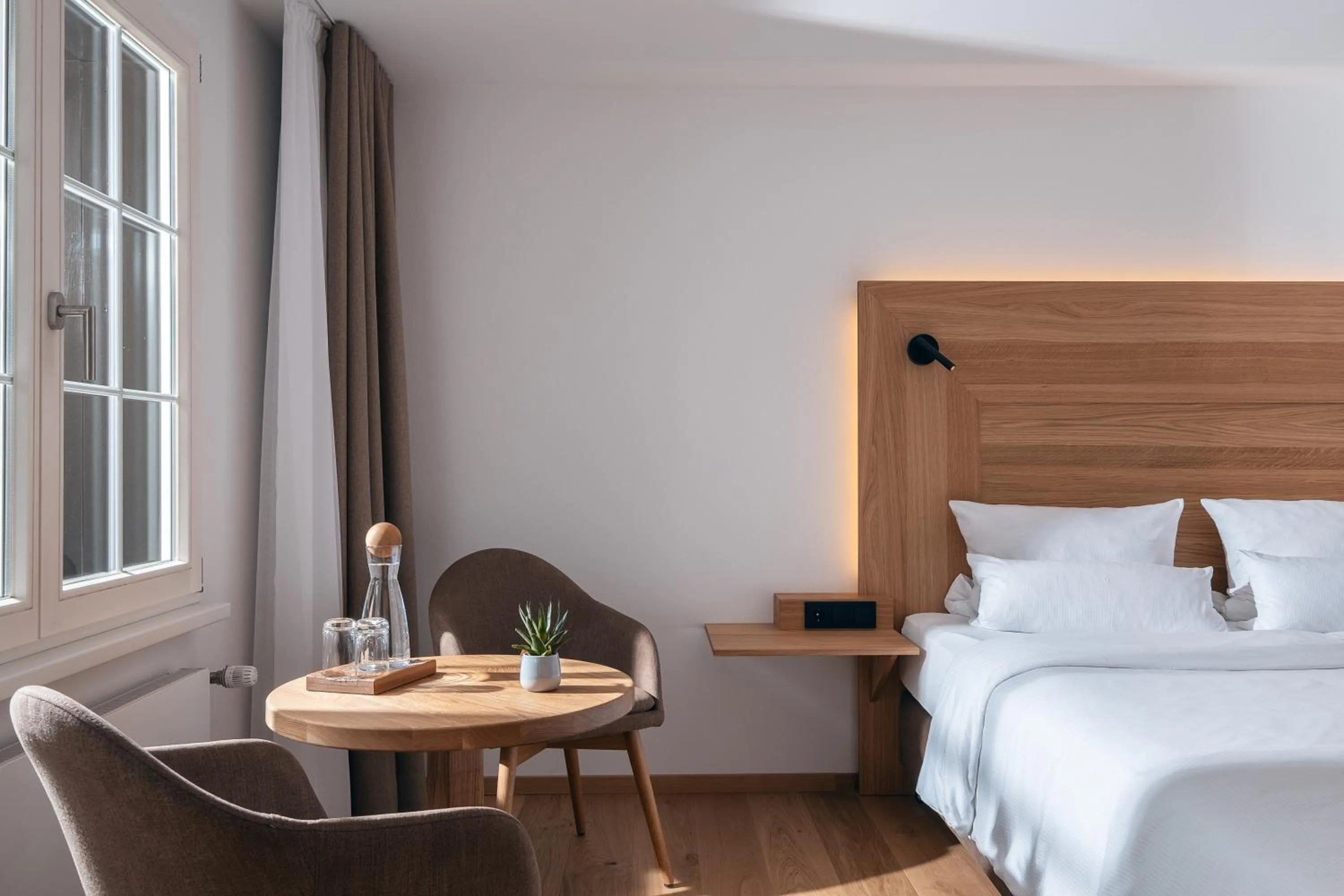 Seating area, Bed in ADLER HÄUSERN Gourmet & Spa Hotel