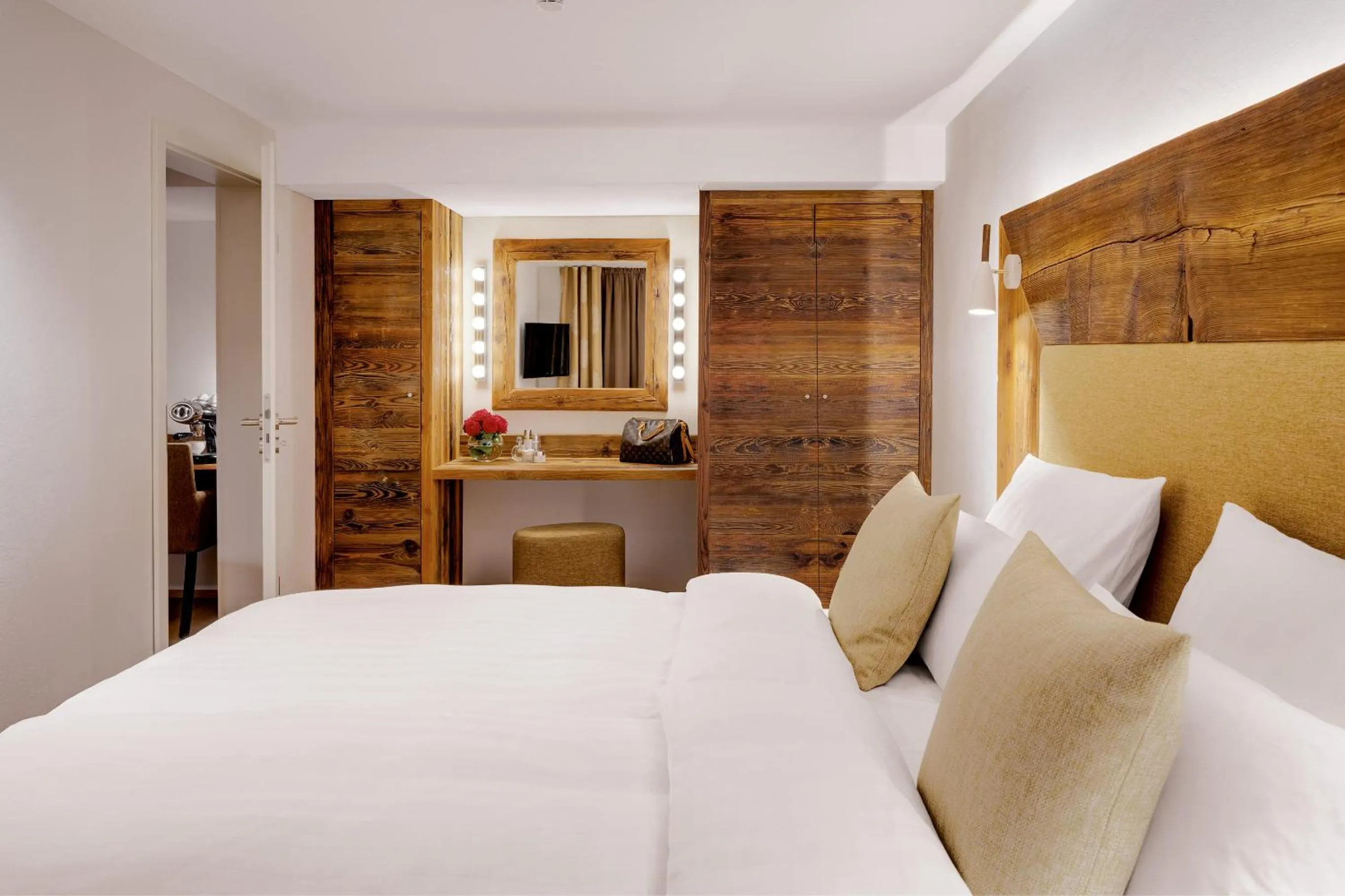 Photo of the whole room, Bed in ADLER HÄUSERN Gourmet & Spa Hotel