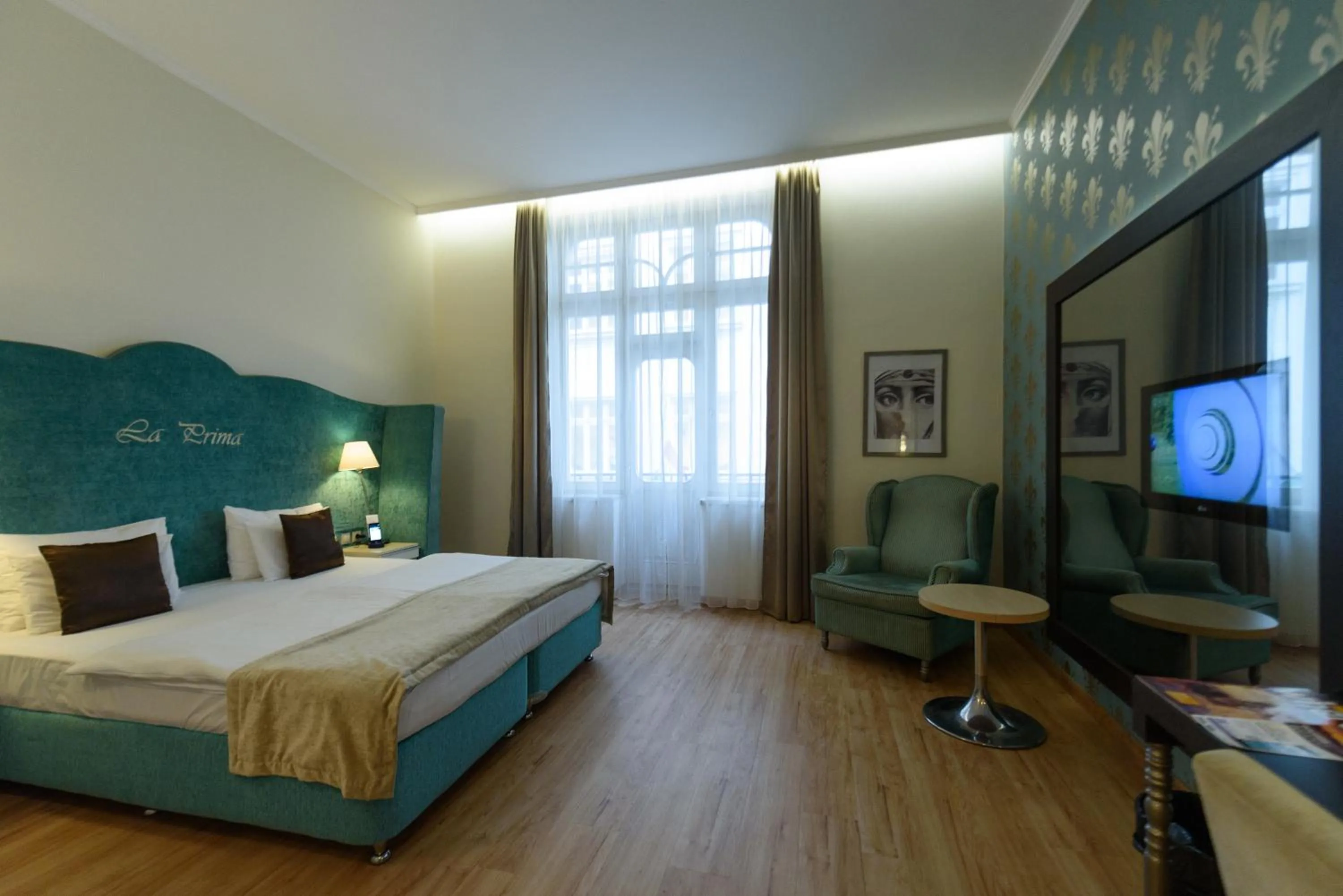 Bed in La Prima Fashion Hotel Budapest