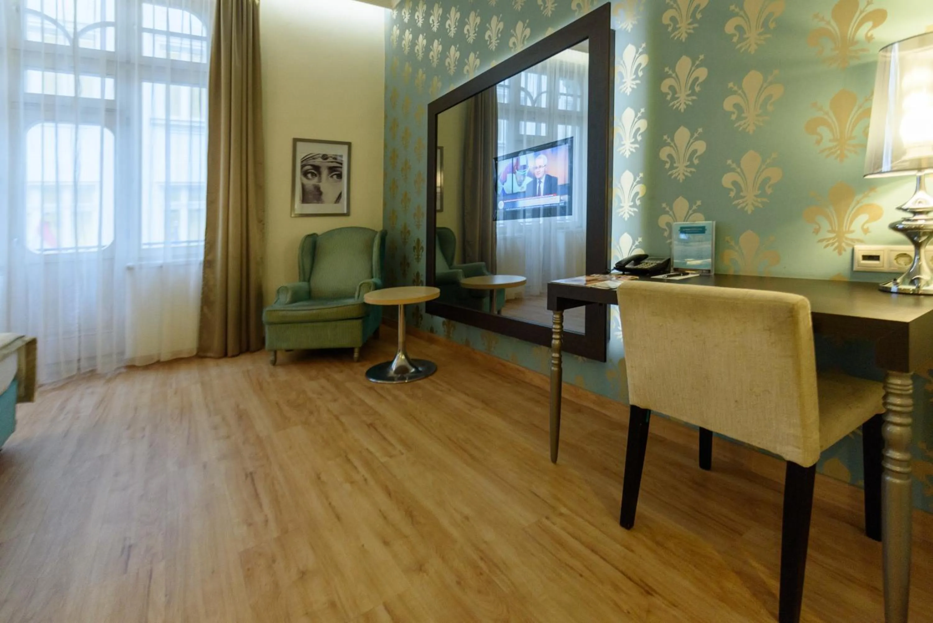 Seating area in La Prima Fashion Hotel Budapest