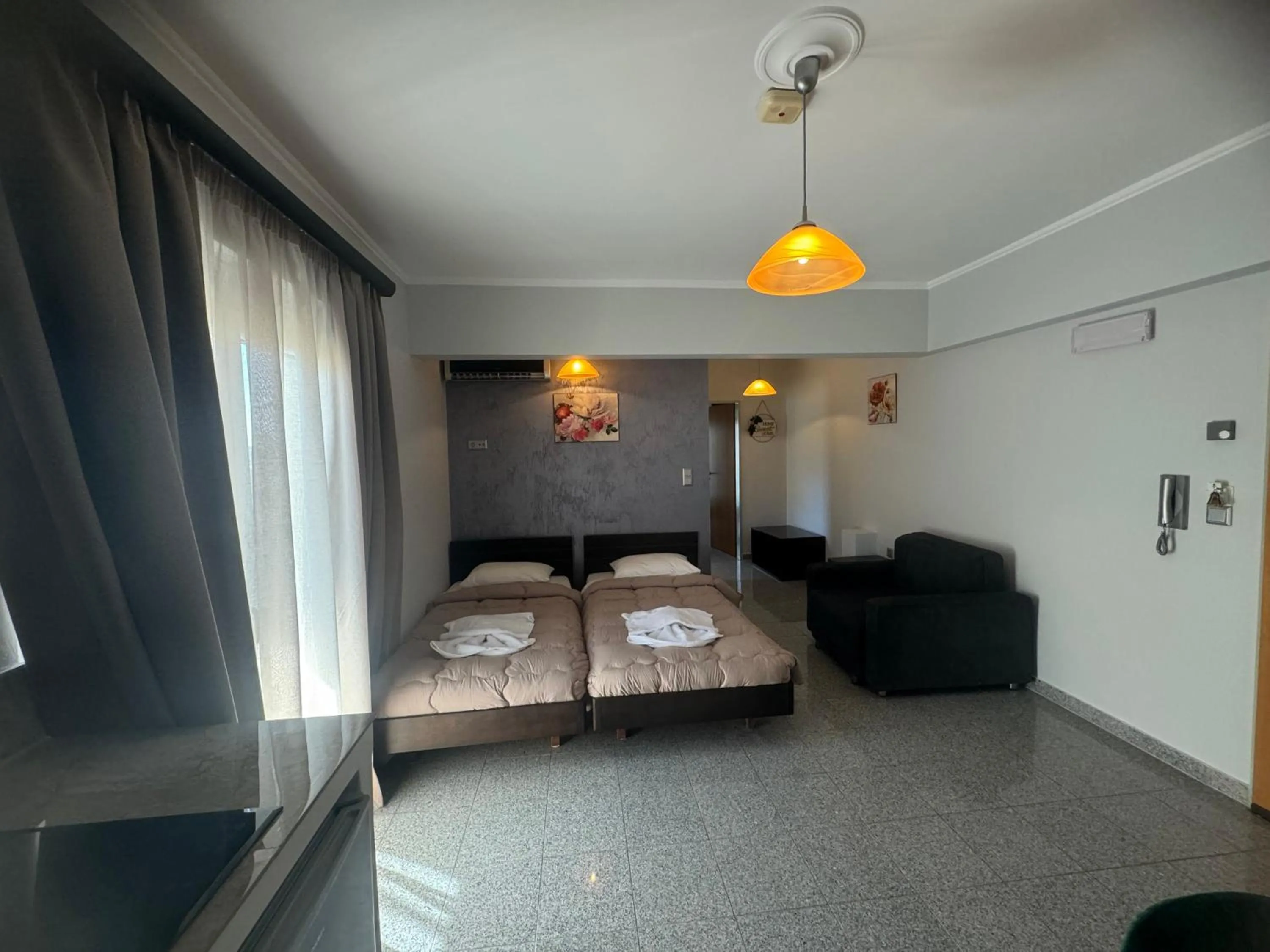 Bed in Comfort Hotel Apartments