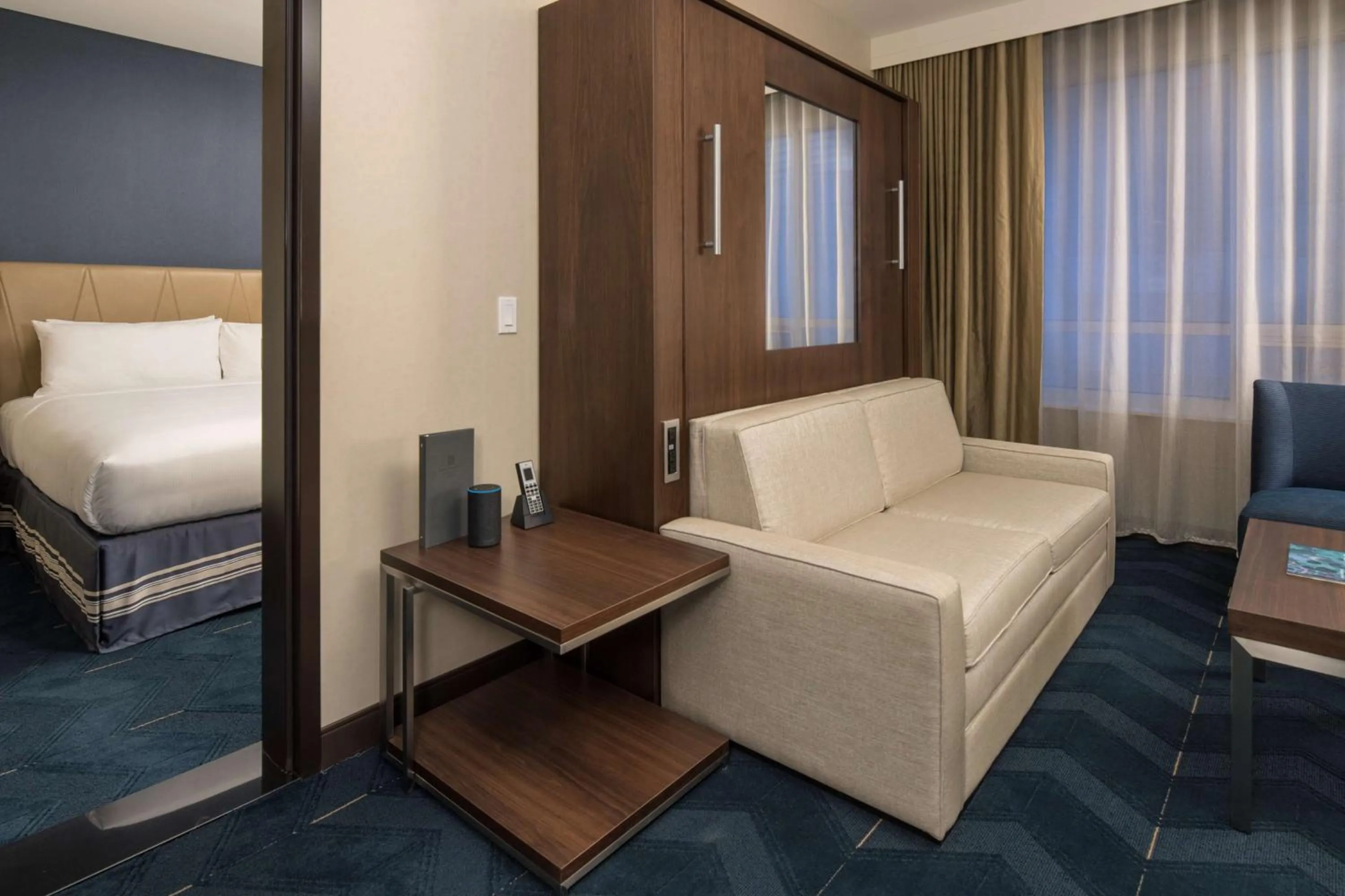 Living room, Bed in Embassy Suites By Hilton Seattle Downtown Pioneer Square