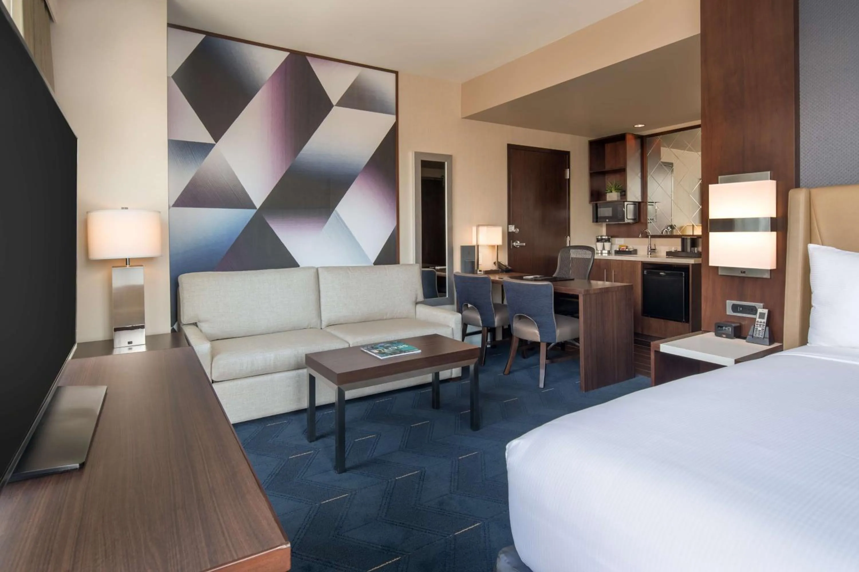 Living room, Bed in Embassy Suites By Hilton Seattle Downtown Pioneer Square