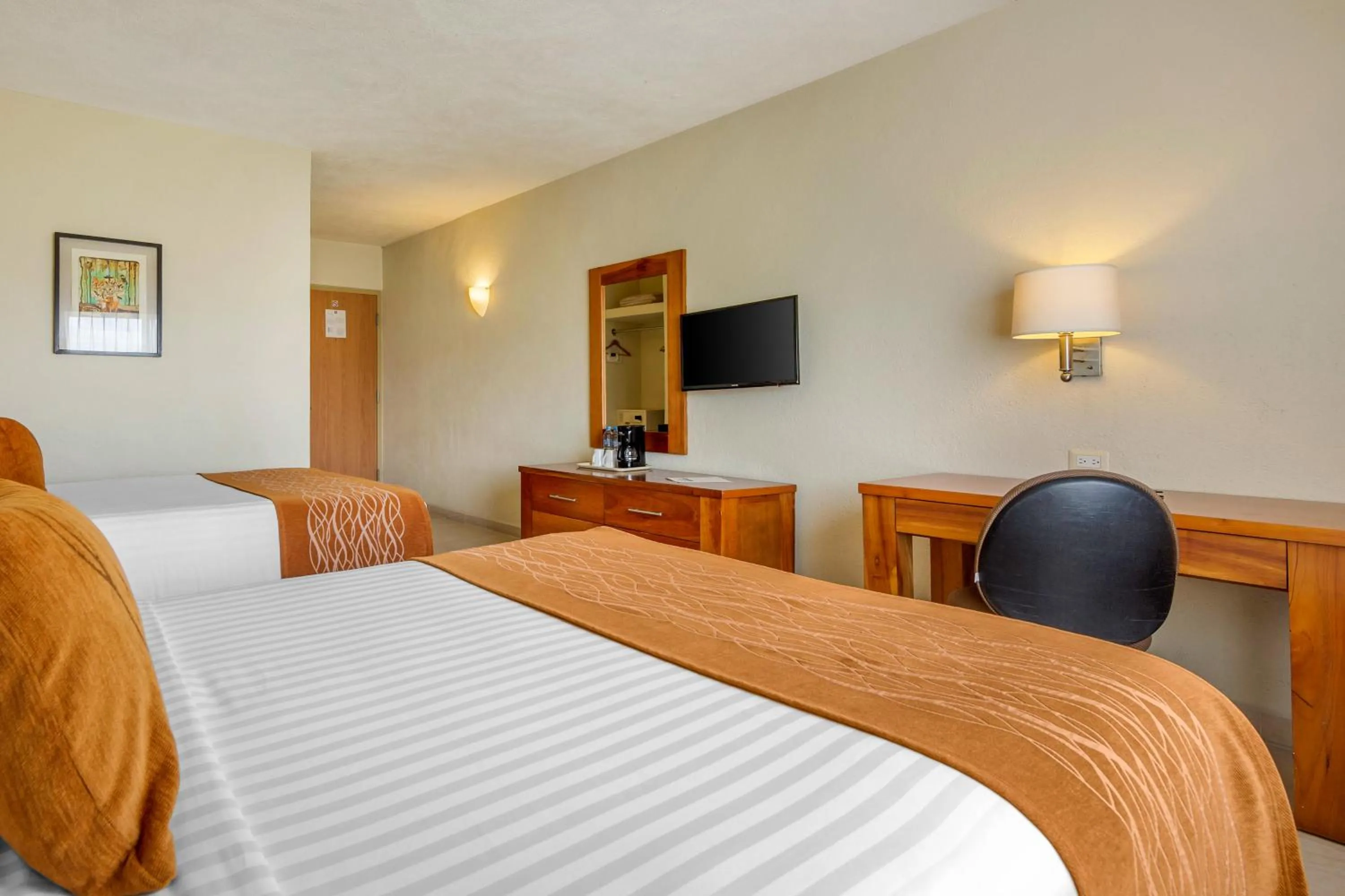 Bedroom, Bed in Comfort Inn Puerto Vallarta Golfside & Marina