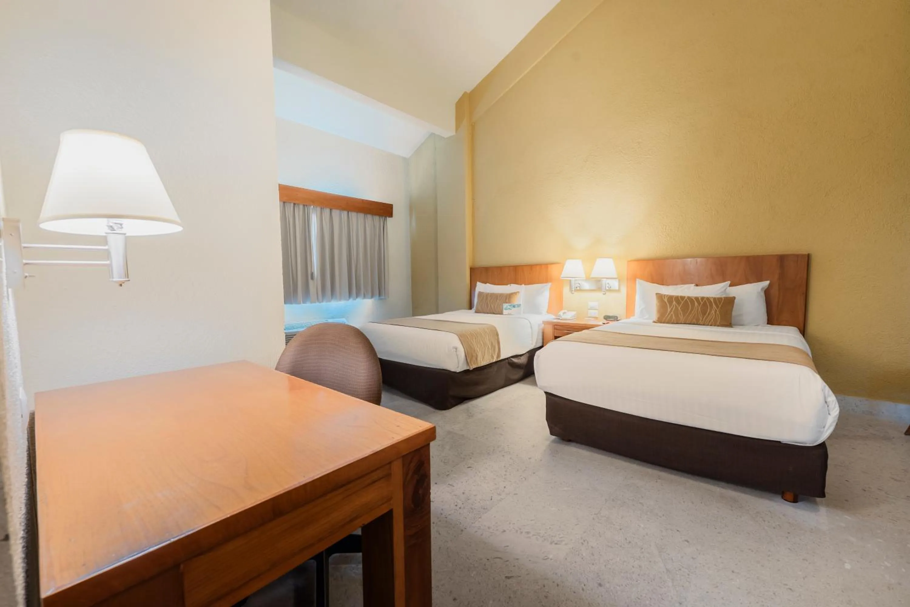 Bedroom, Bed in Comfort Inn Puerto Vallarta Golfside & Marina