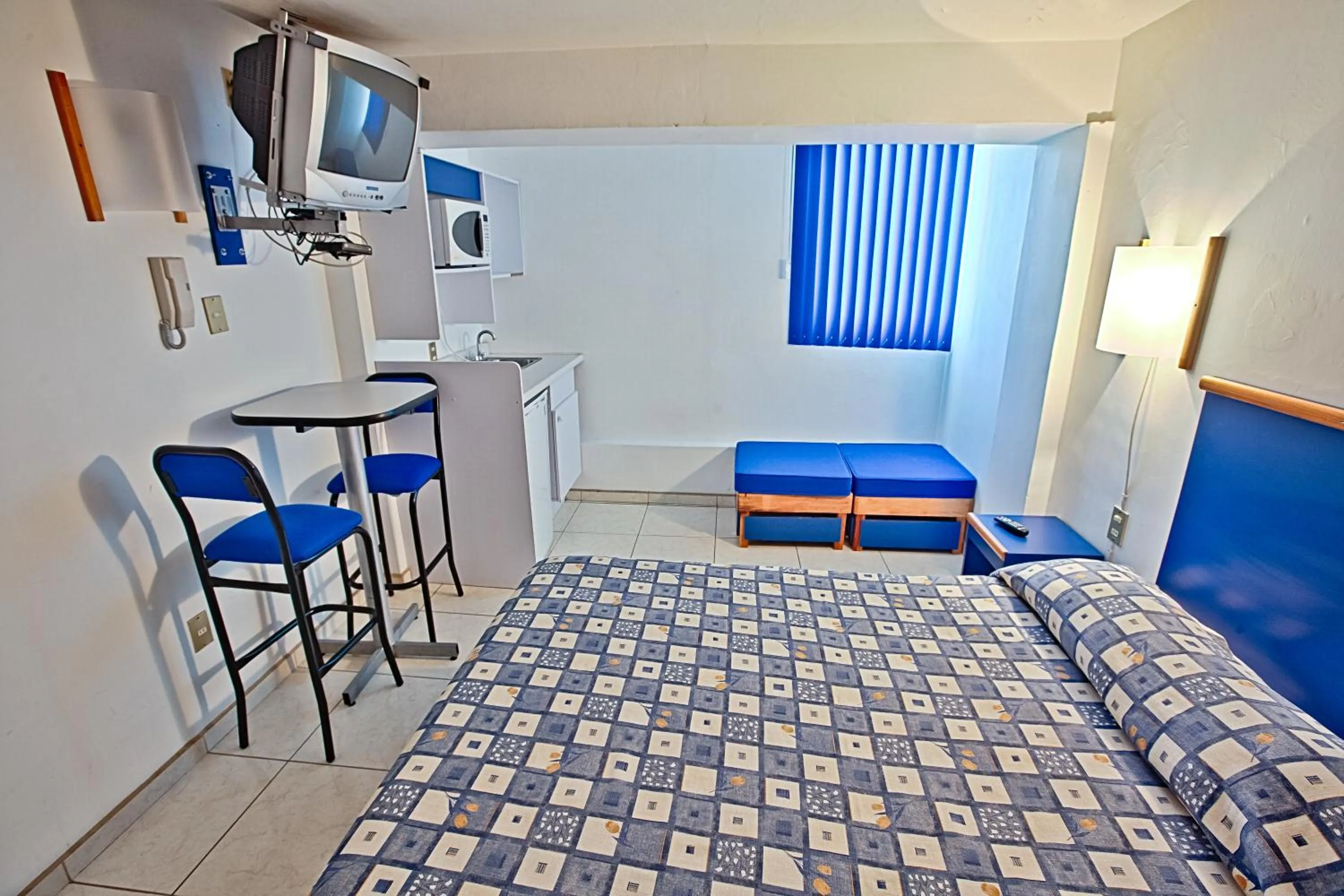 Bed in Hotel H Americas