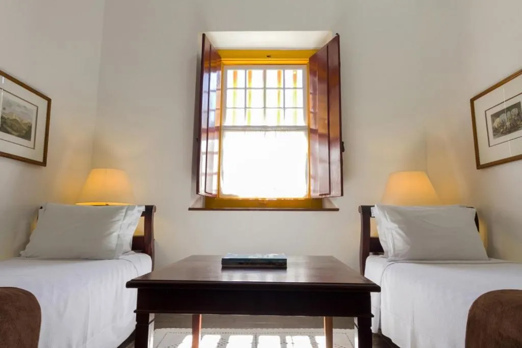 Bed in Pousada do Ouro