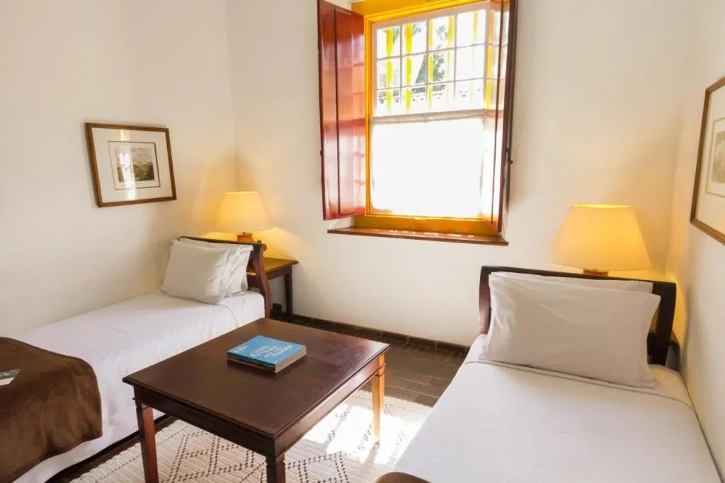 Bed in Pousada do Ouro