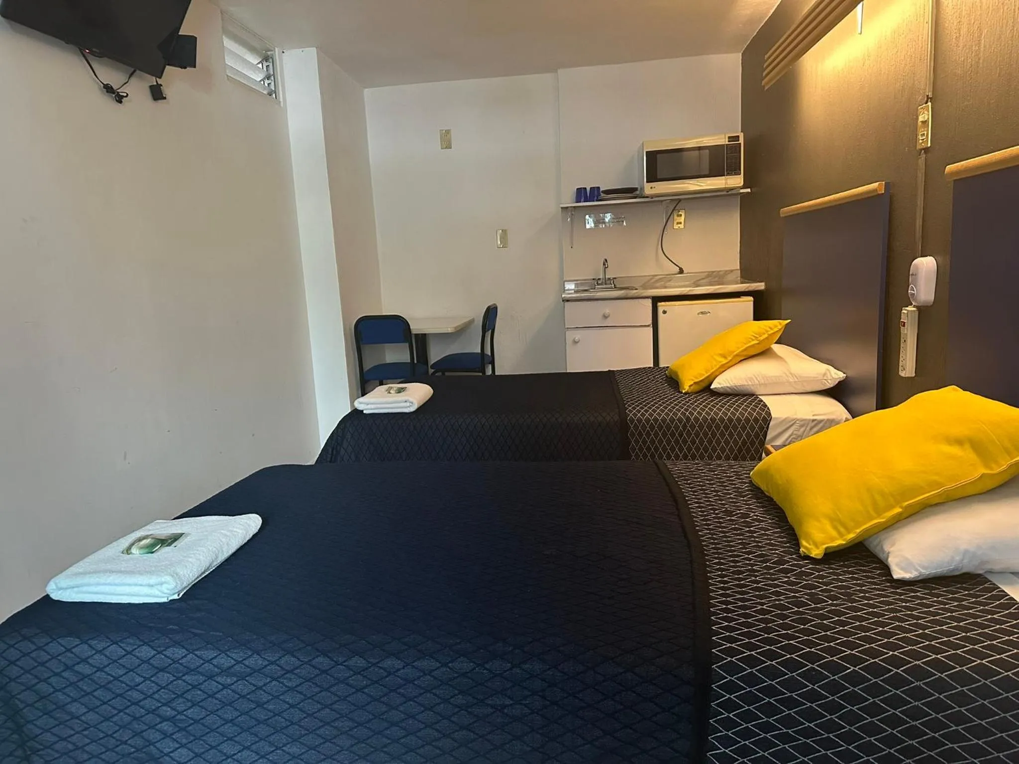 Photo of the whole room, Bed in Vagabundo Expo Guadalajara