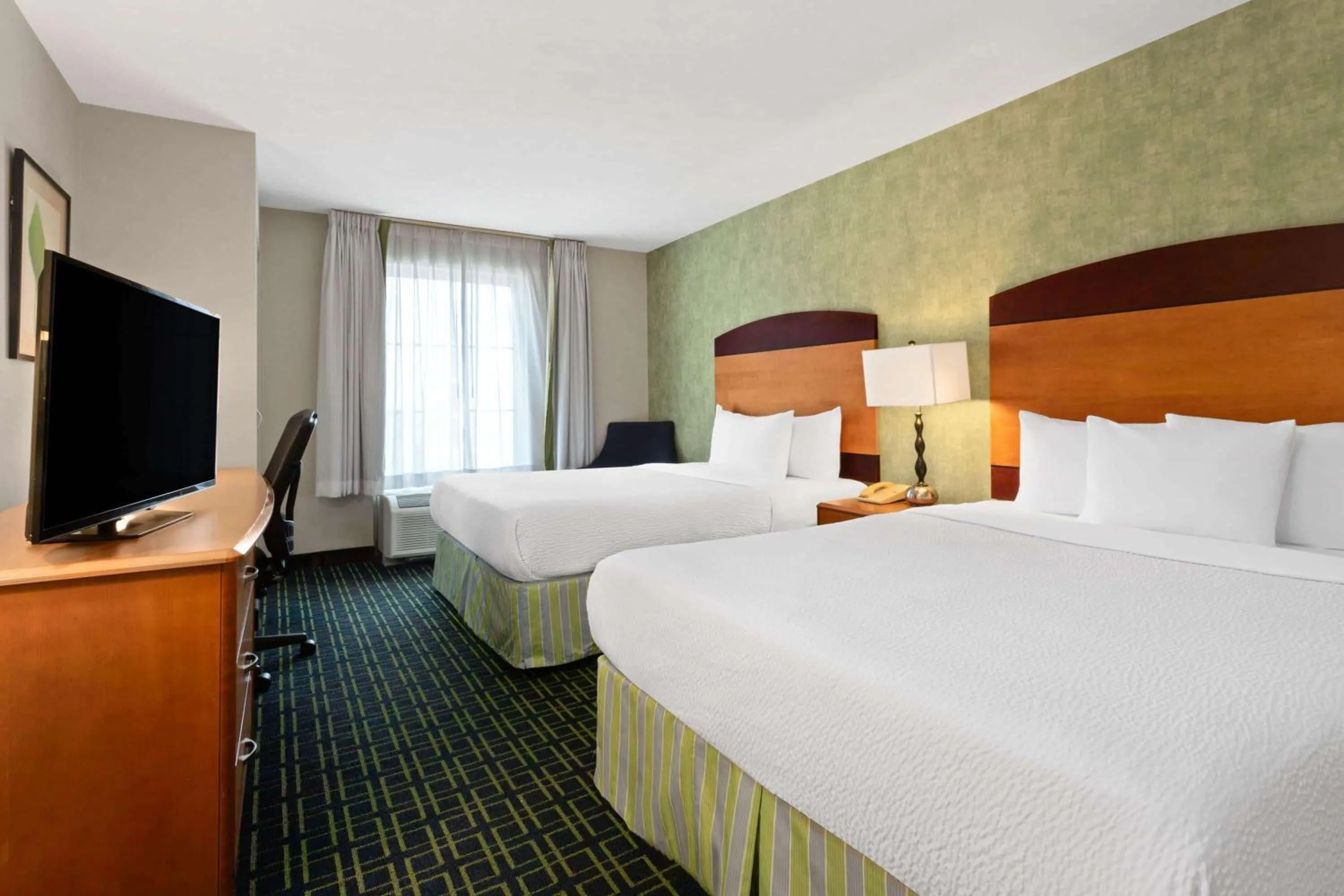 Photo of the whole room, Bed in Wyndham Garden Monterrey Aeropuerto