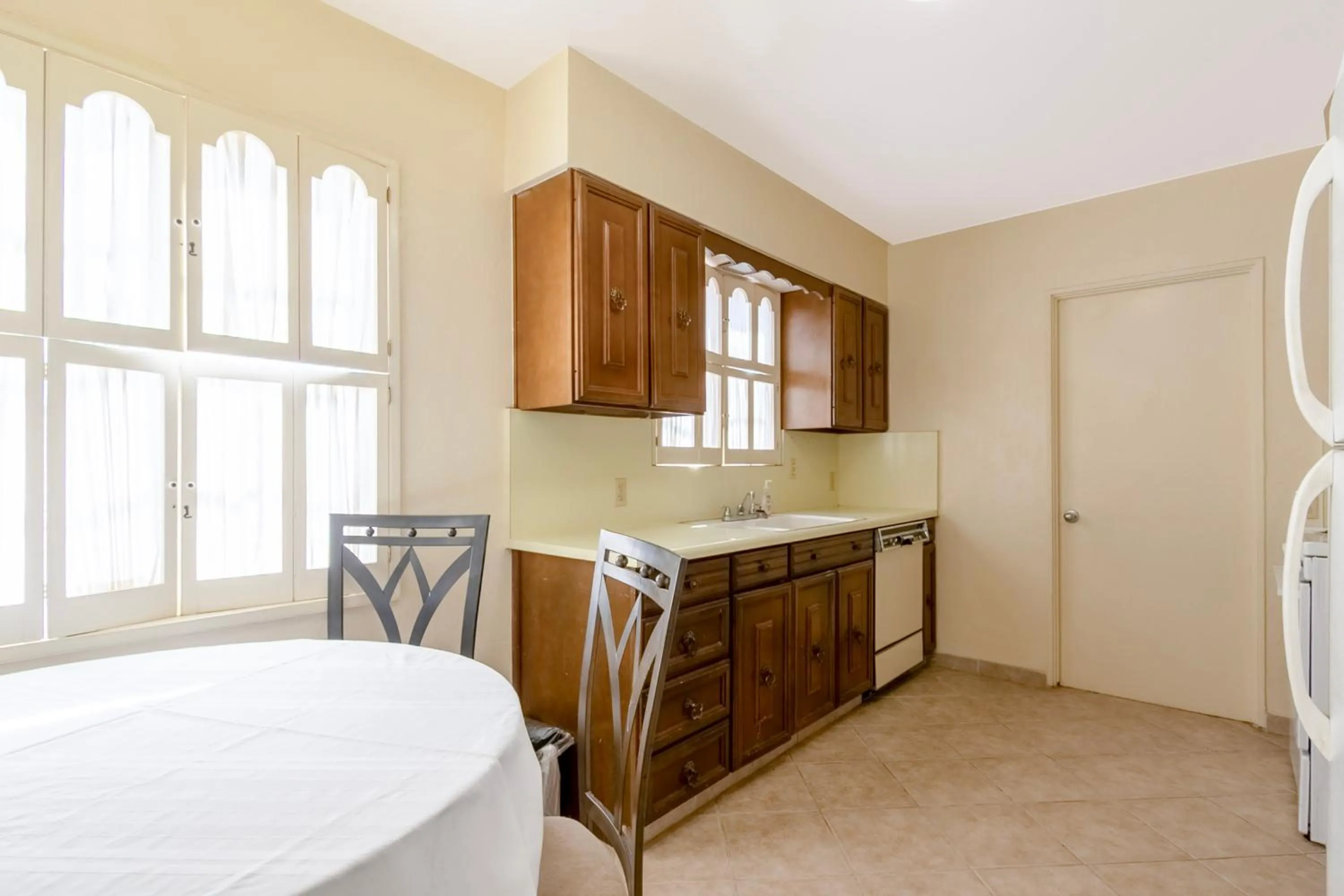 Dining area in Historic Coronado Motor Hotel by OYO