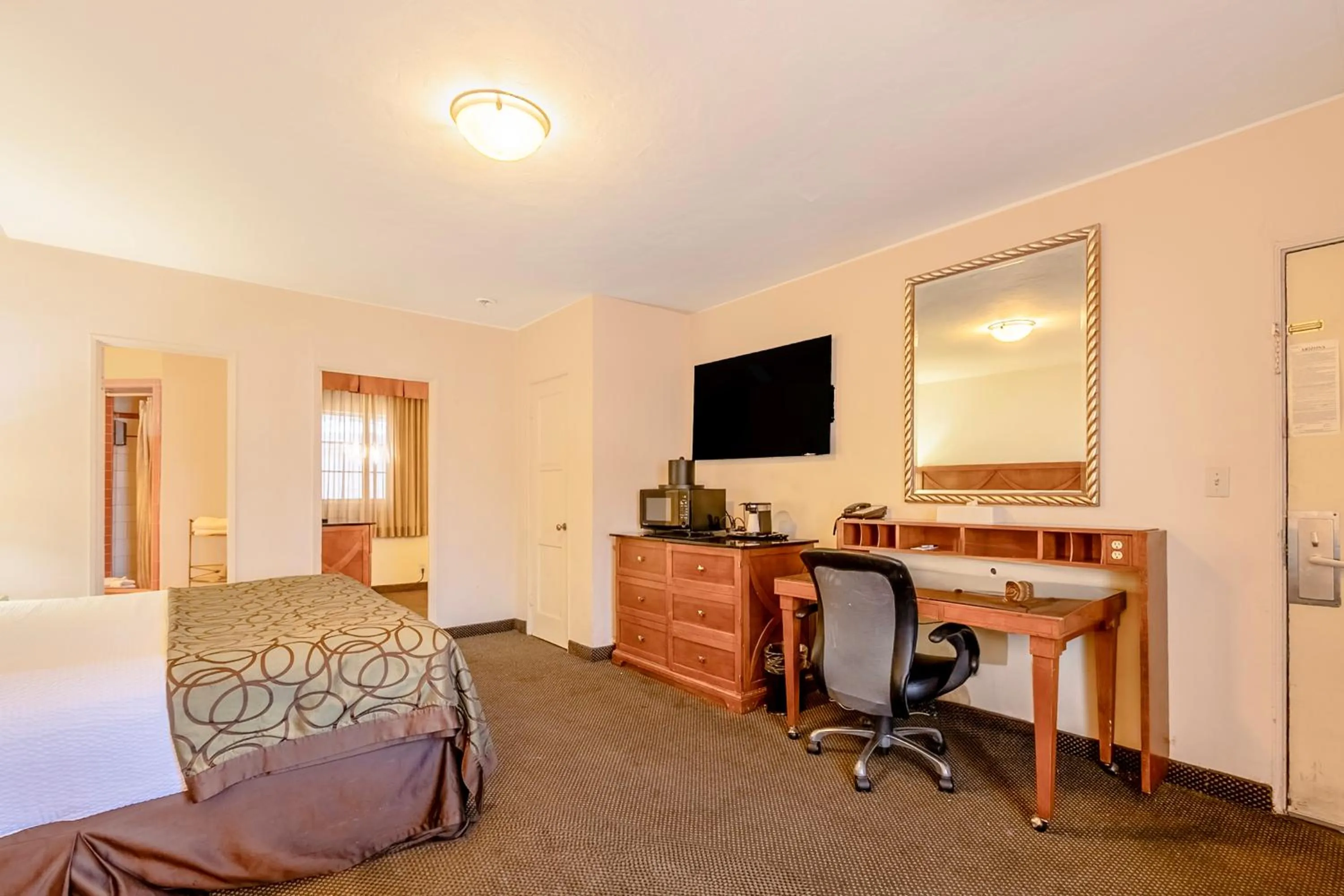 Bedroom, Bed in Historic Coronado Motor Hotel by OYO