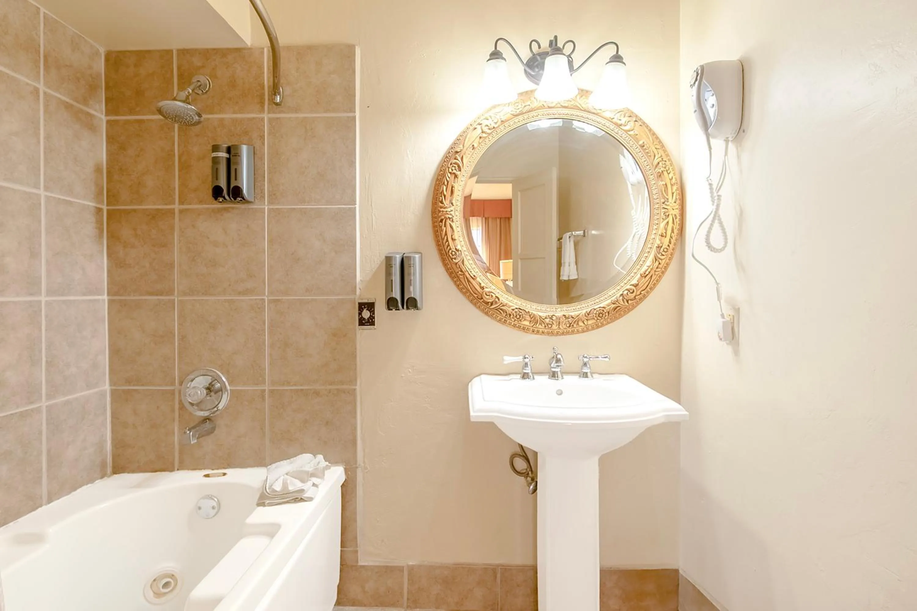 Bathroom in Historic Coronado Motor Hotel by OYO