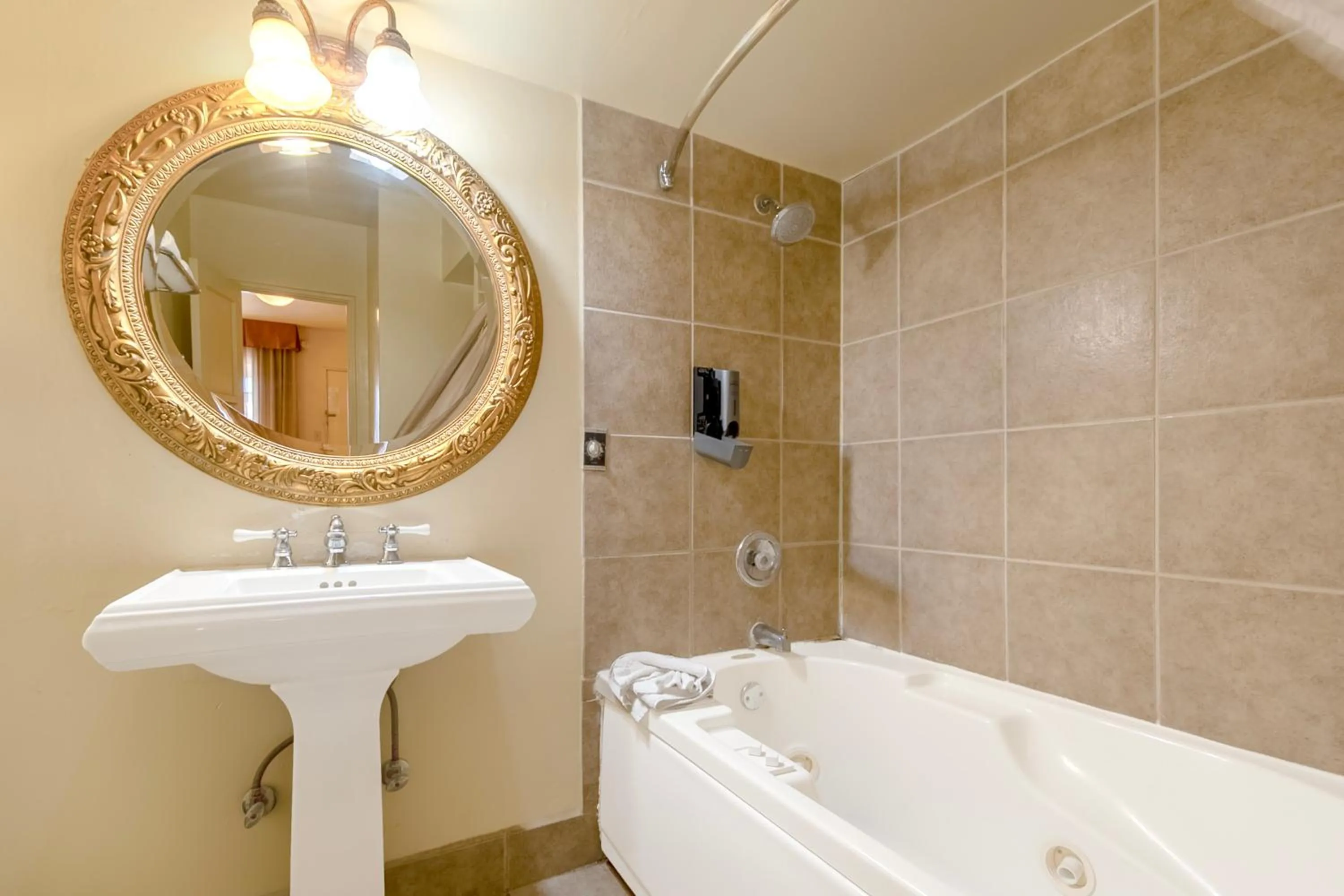 Bathroom in Historic Coronado Motor Hotel by OYO