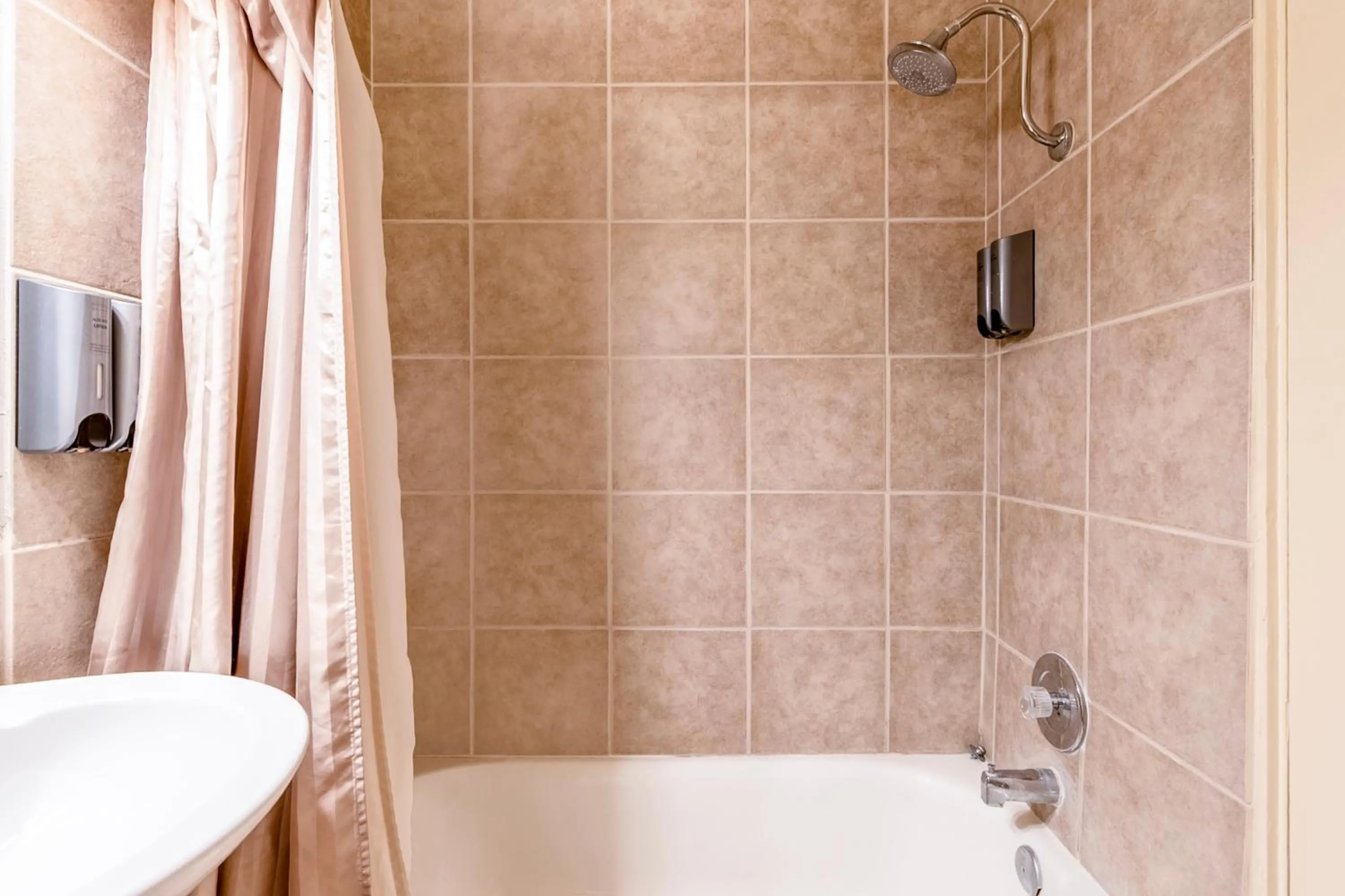 Bathroom in Historic Coronado Motor Hotel by OYO