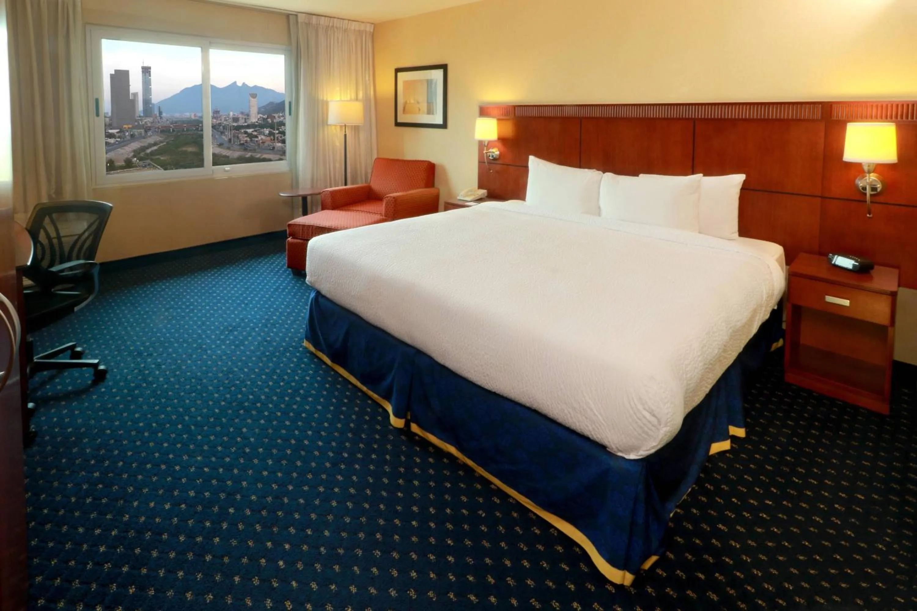 Photo of the whole room, Bed in Courtyard Monterrey San Jeronimo