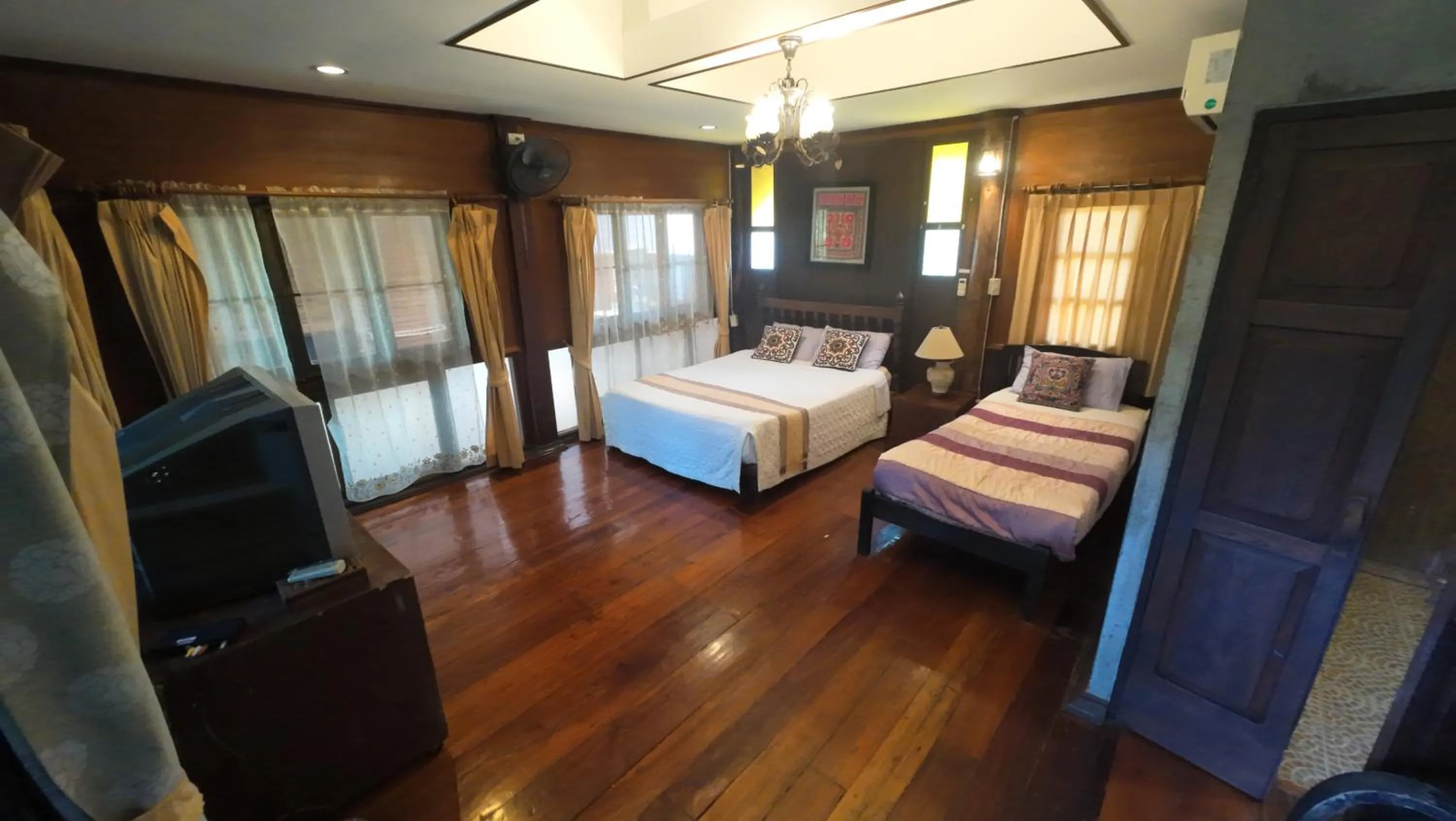 Bed in Baantawan Guesthouse Pai