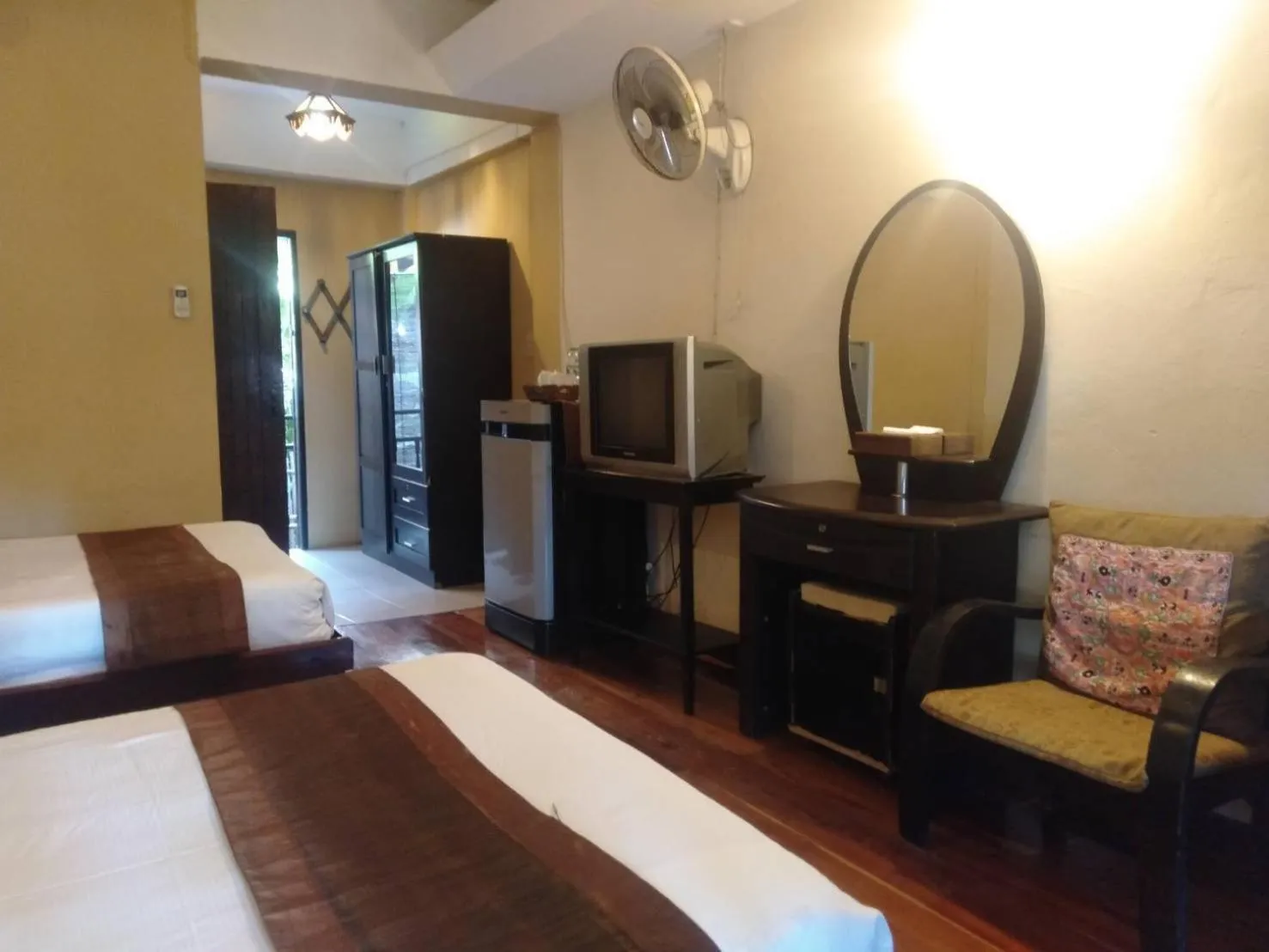 Bed in Baantawan Guesthouse Pai